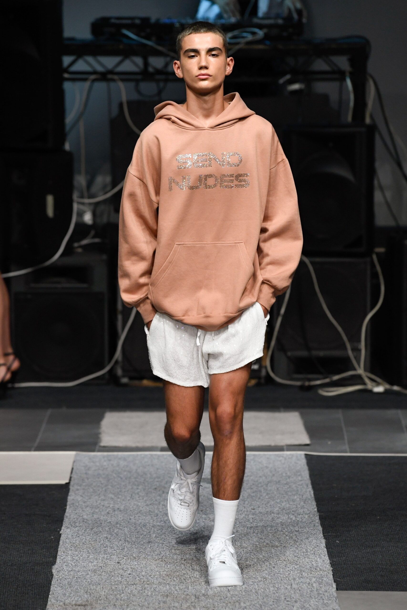 pink oversized hoodie with white shorts