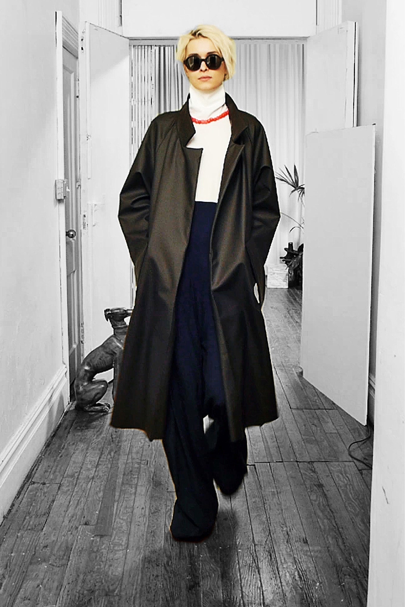 black cotton long-sleeve collared relaxed buttoned coat