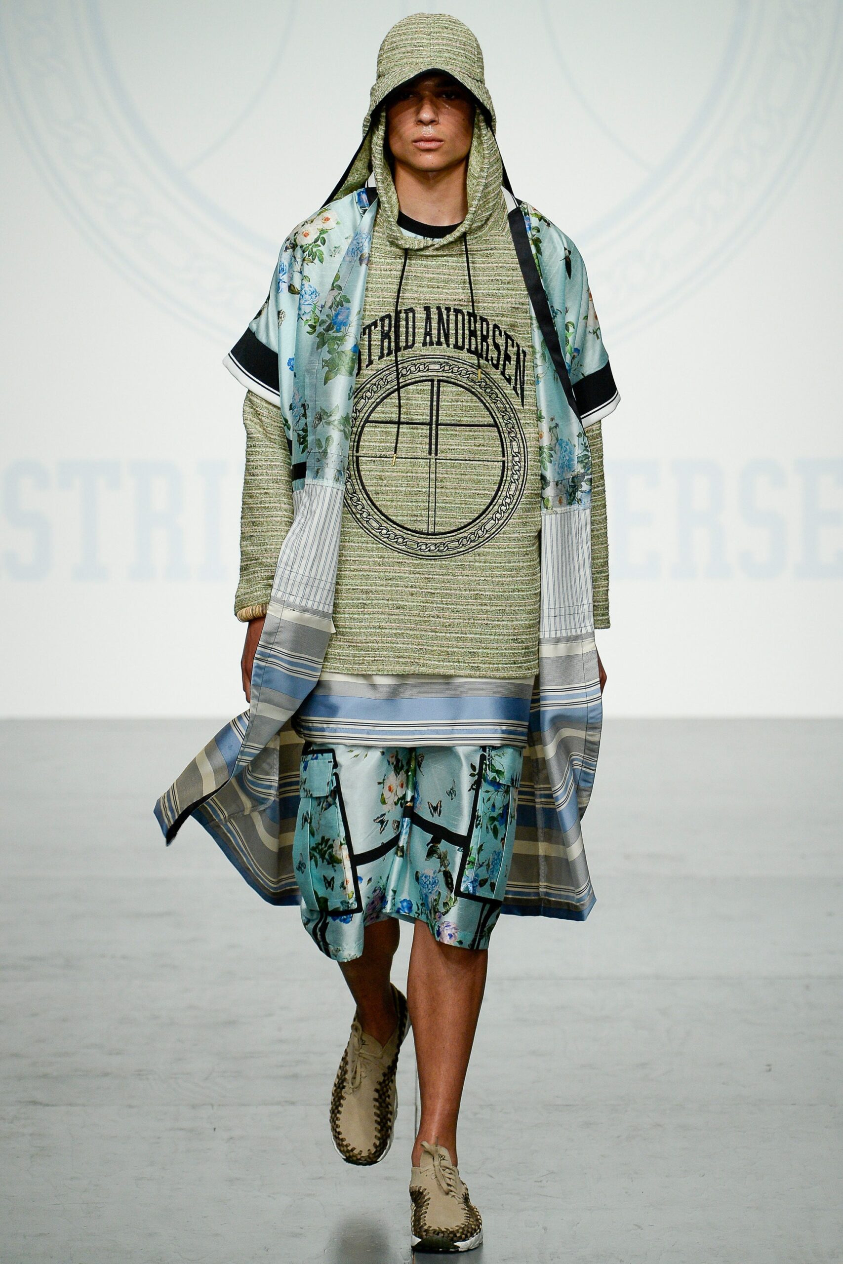 green hoodie with layered cape