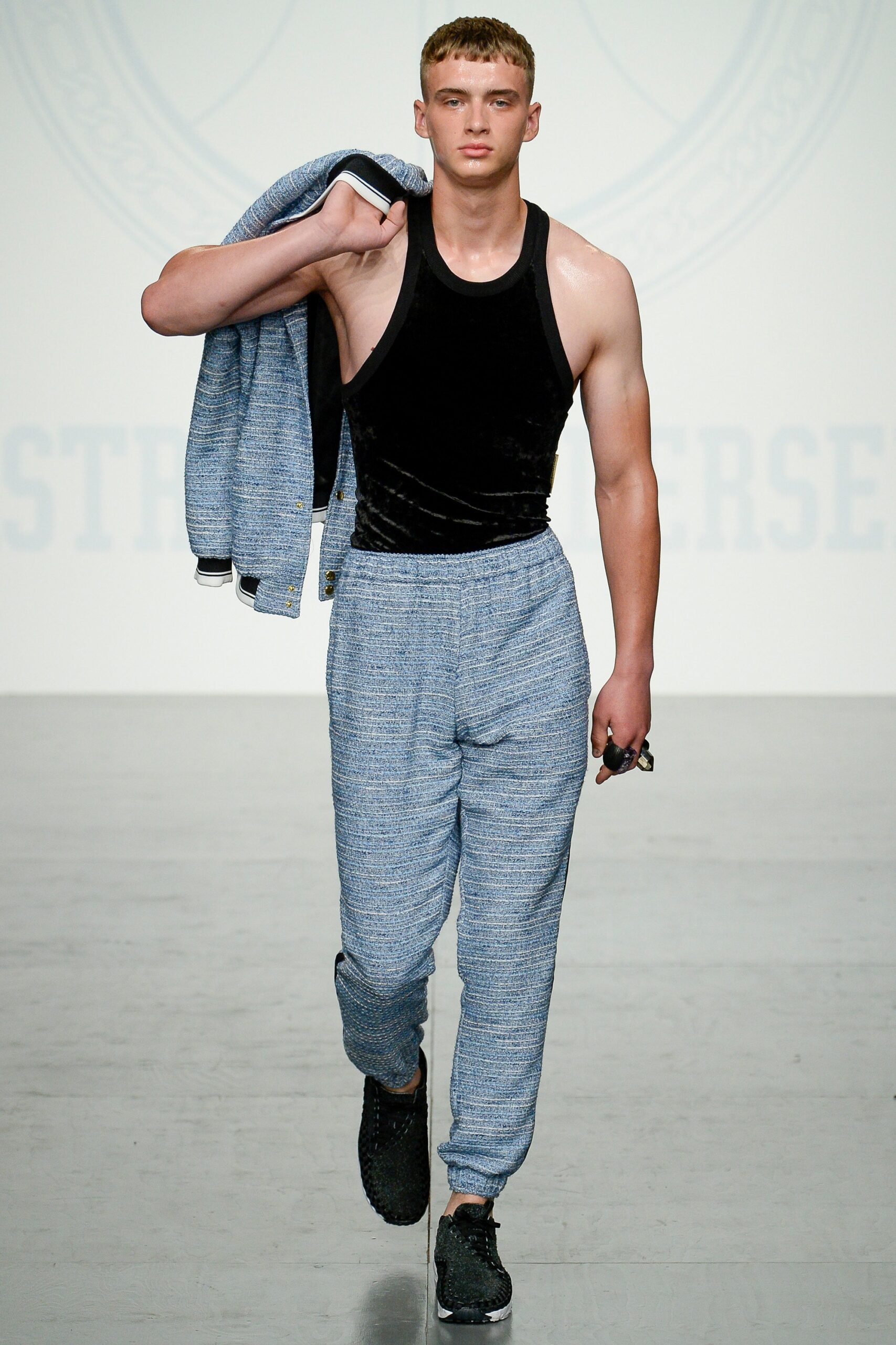 black velvet tank-top with blue pants