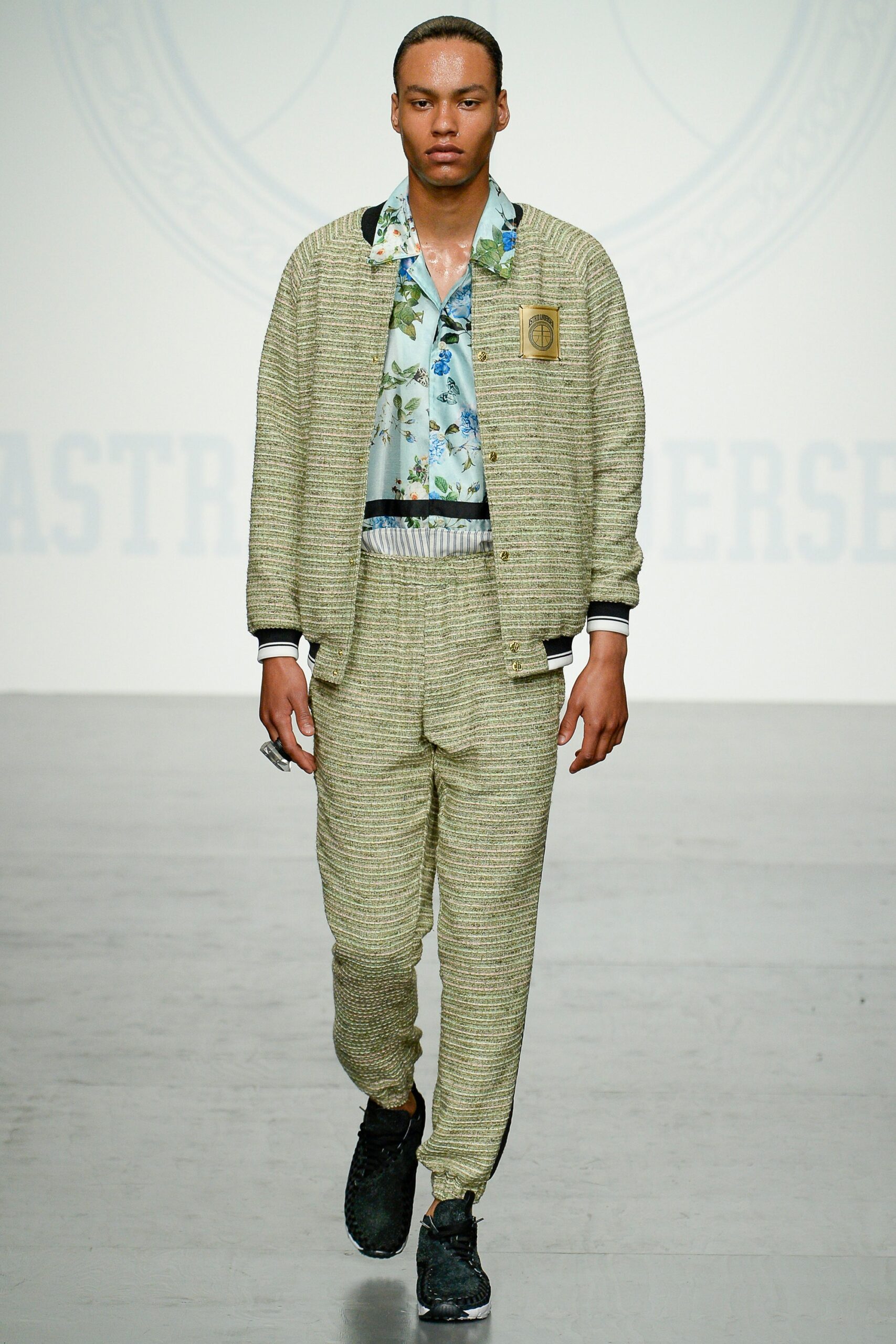 beige tweed jacket with blue shirt