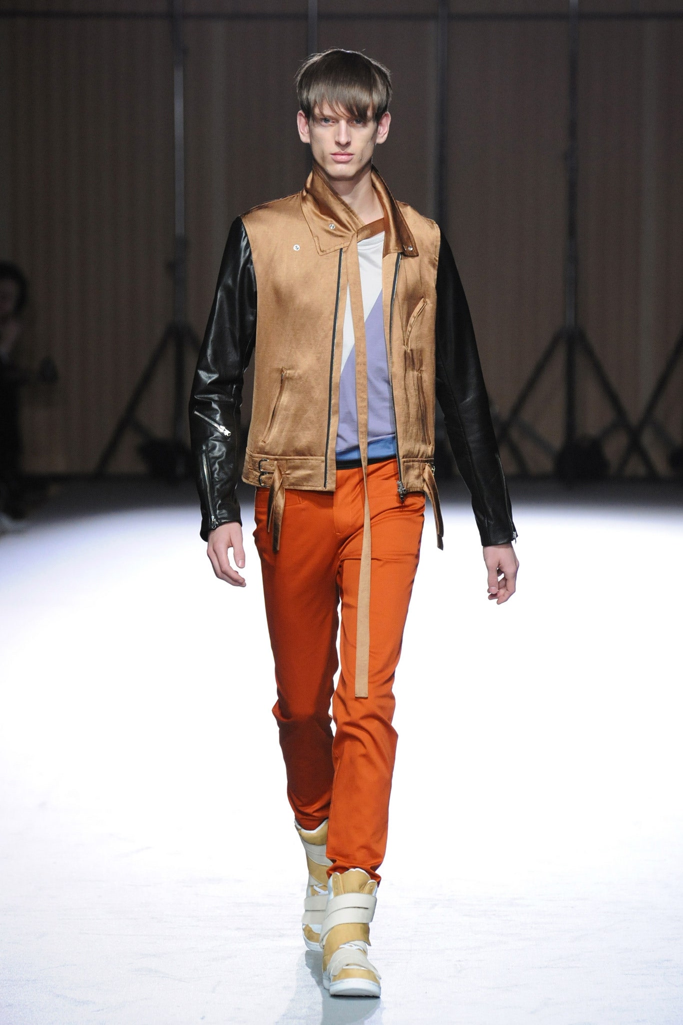 brown leather fitted jacket with orange pants