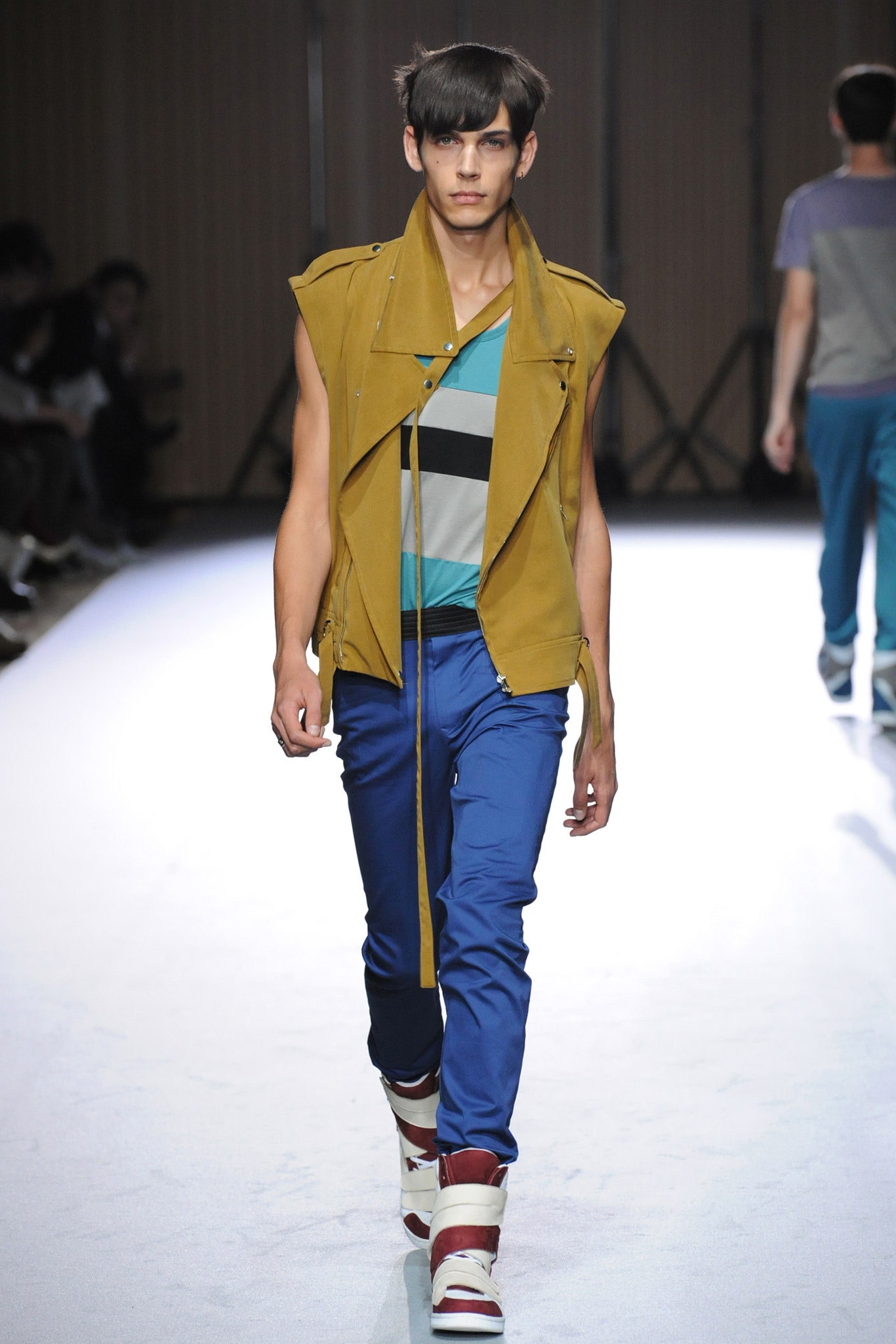 yellow fitted vest with striped t-shirt