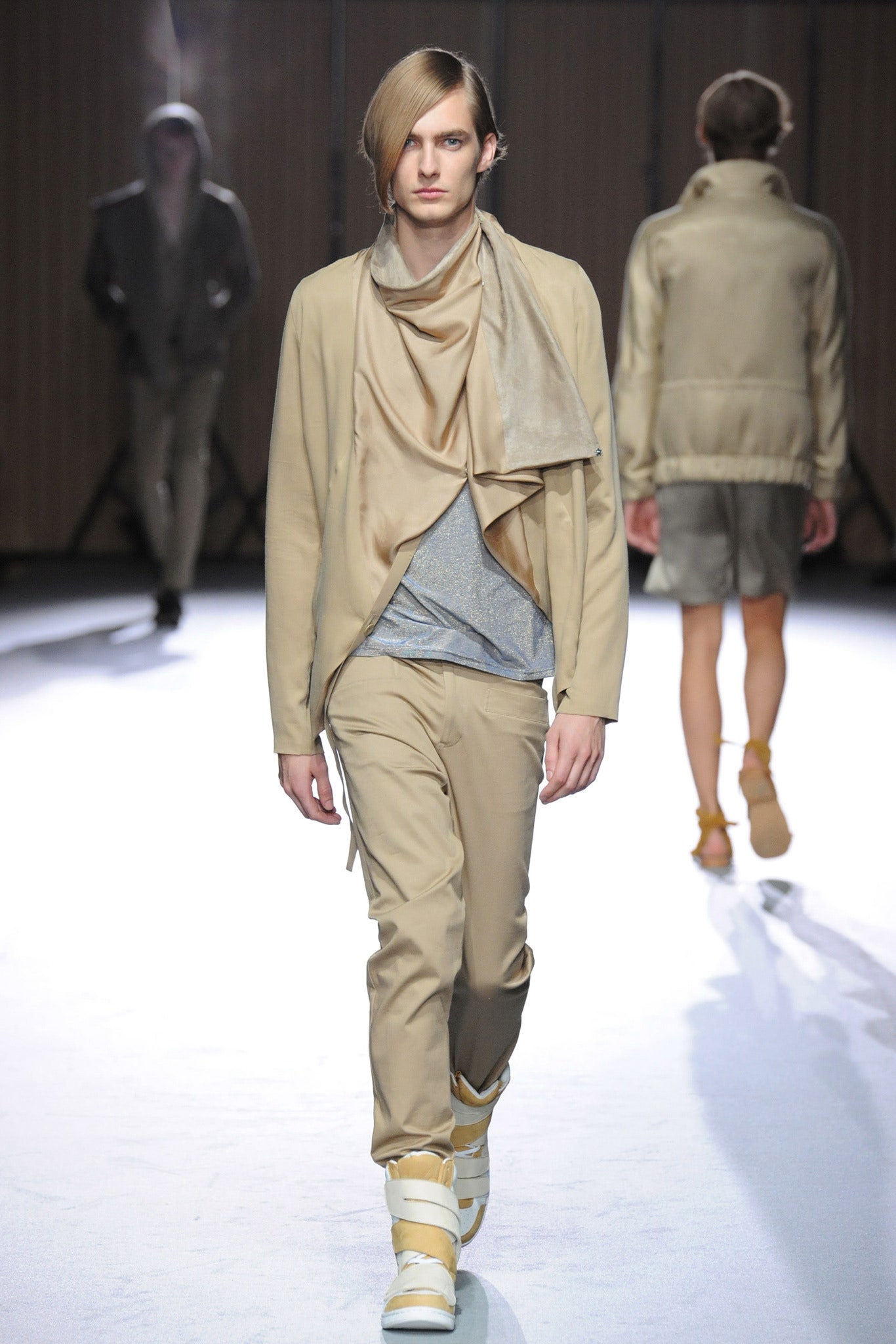 beige jacket gray top beige pants