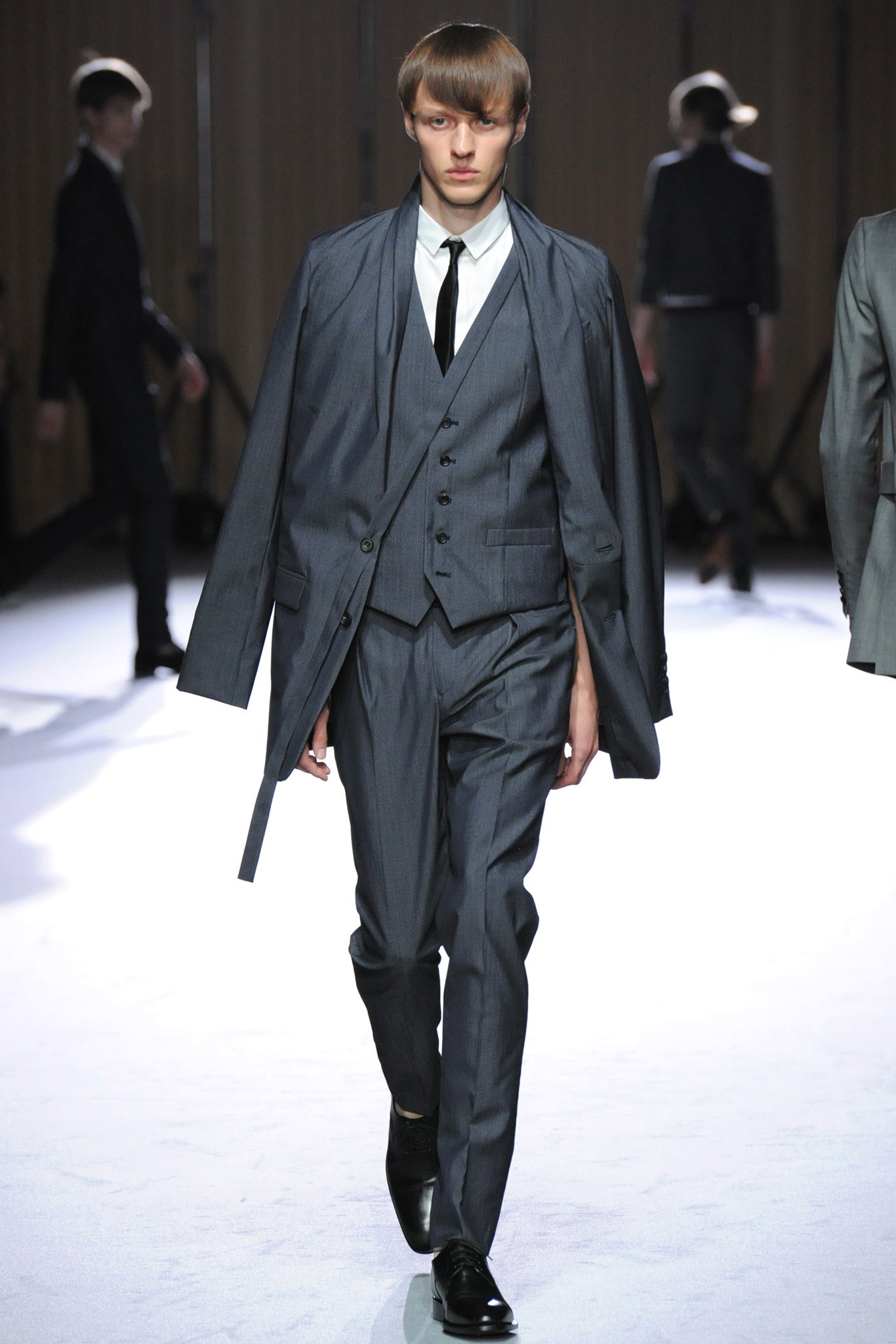 gray tailored suit with white shirt