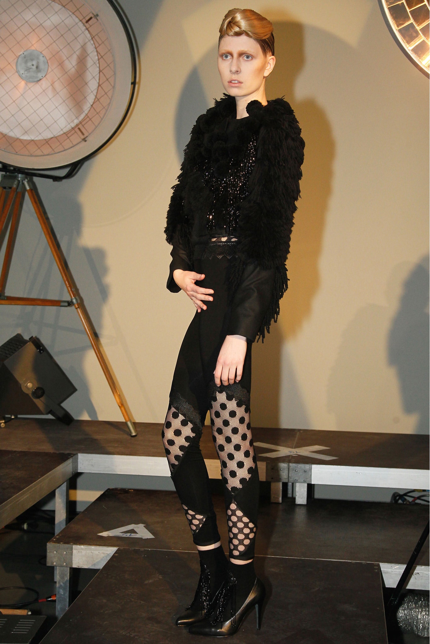 black faux-fur top with fitted pants