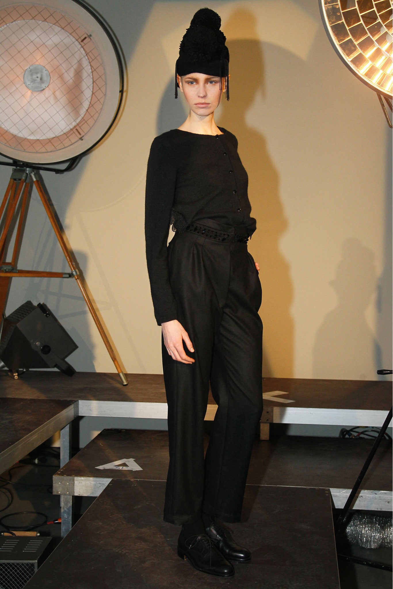 black fitted top and relaxed pants