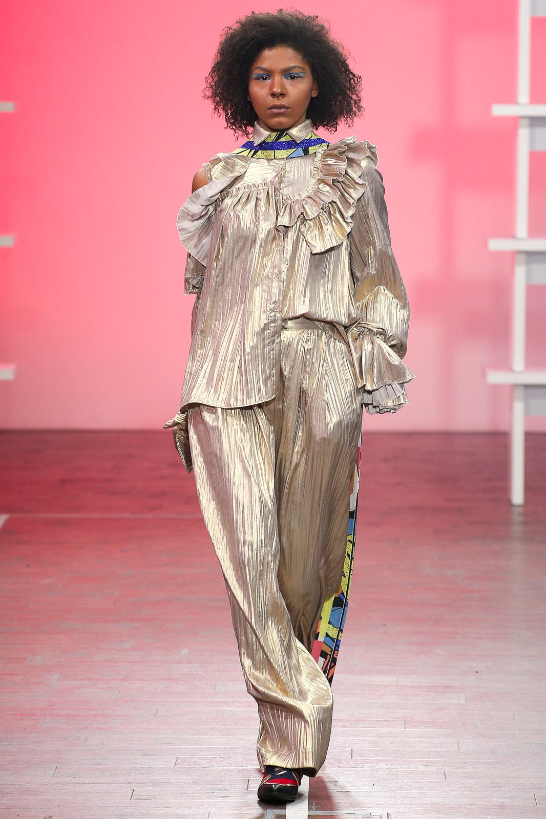 gold silk ruffled blouse and pants