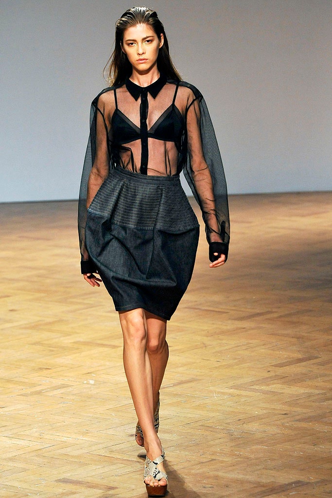 black mesh blouse and pleated skirt