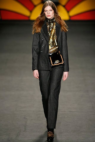 gray tailored suit with gold top