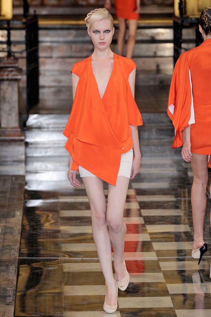 orange sleeveless v-neck relaxed draped top