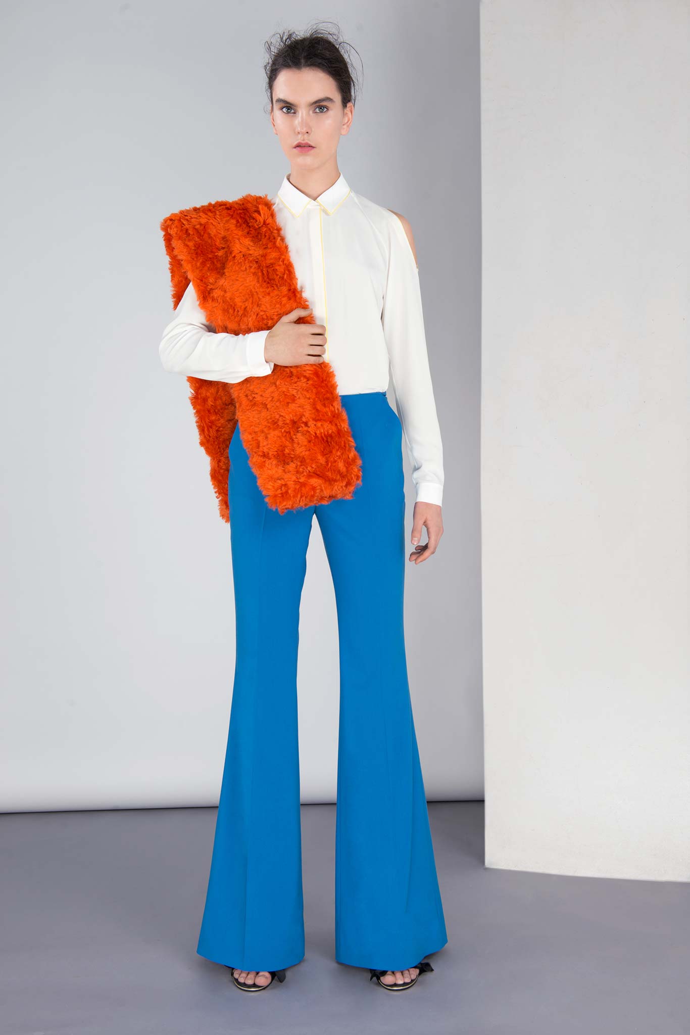 white fitted shirt and blue flared pants