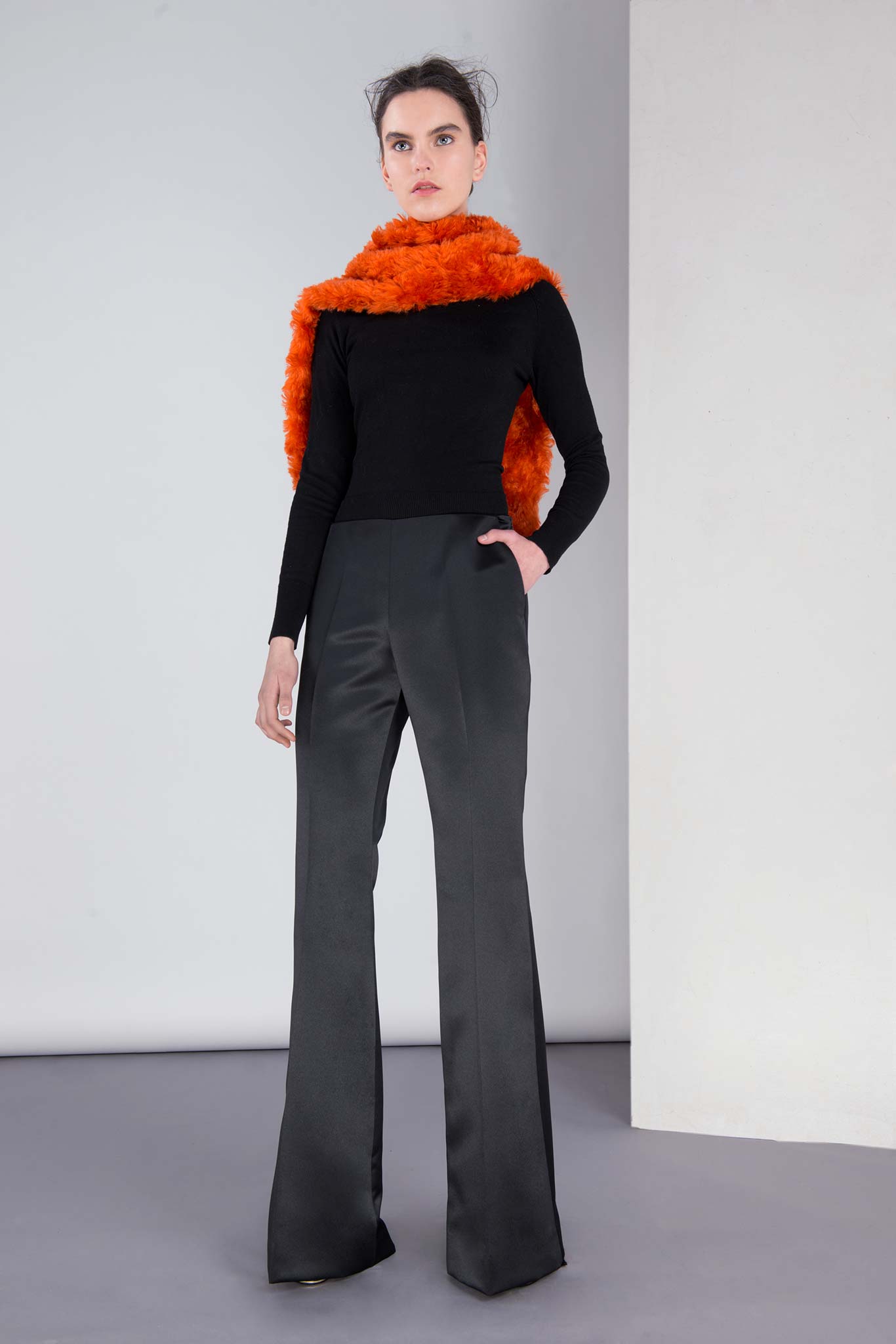 black fitted top with flared pants