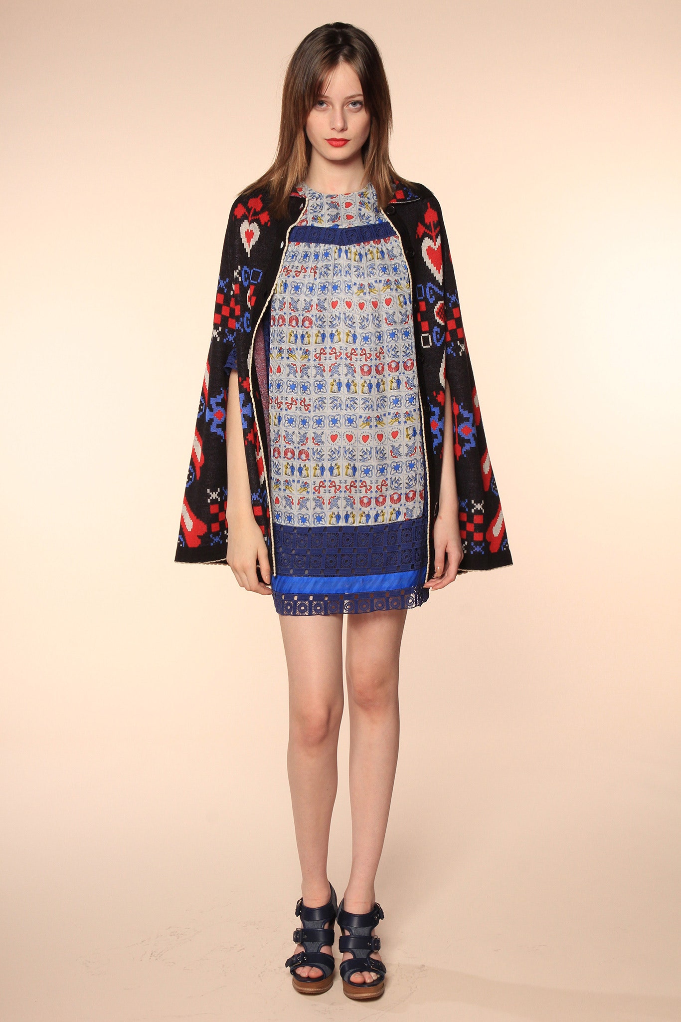 embroidered black cape with mini dress