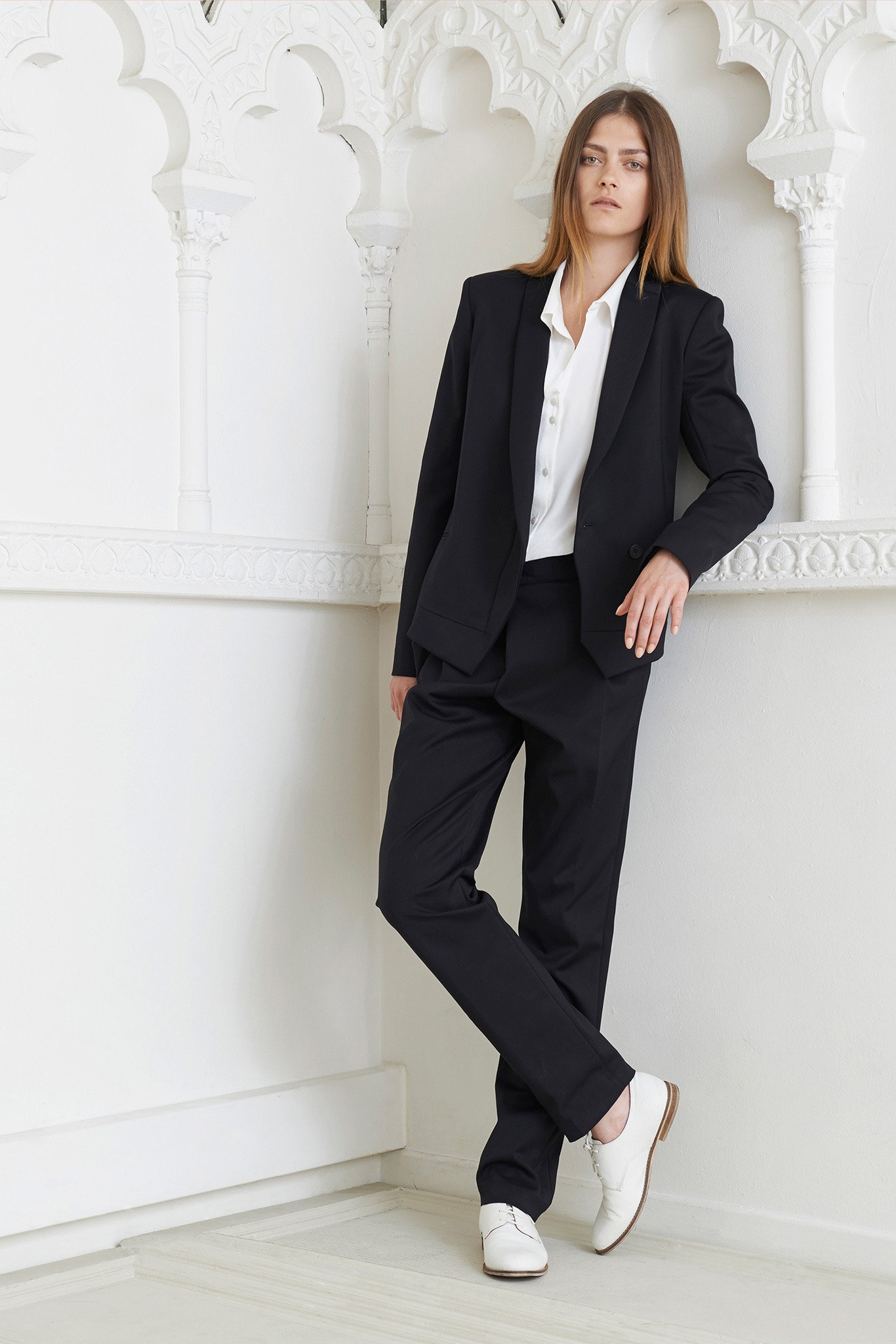 black tailored suit with white shirt