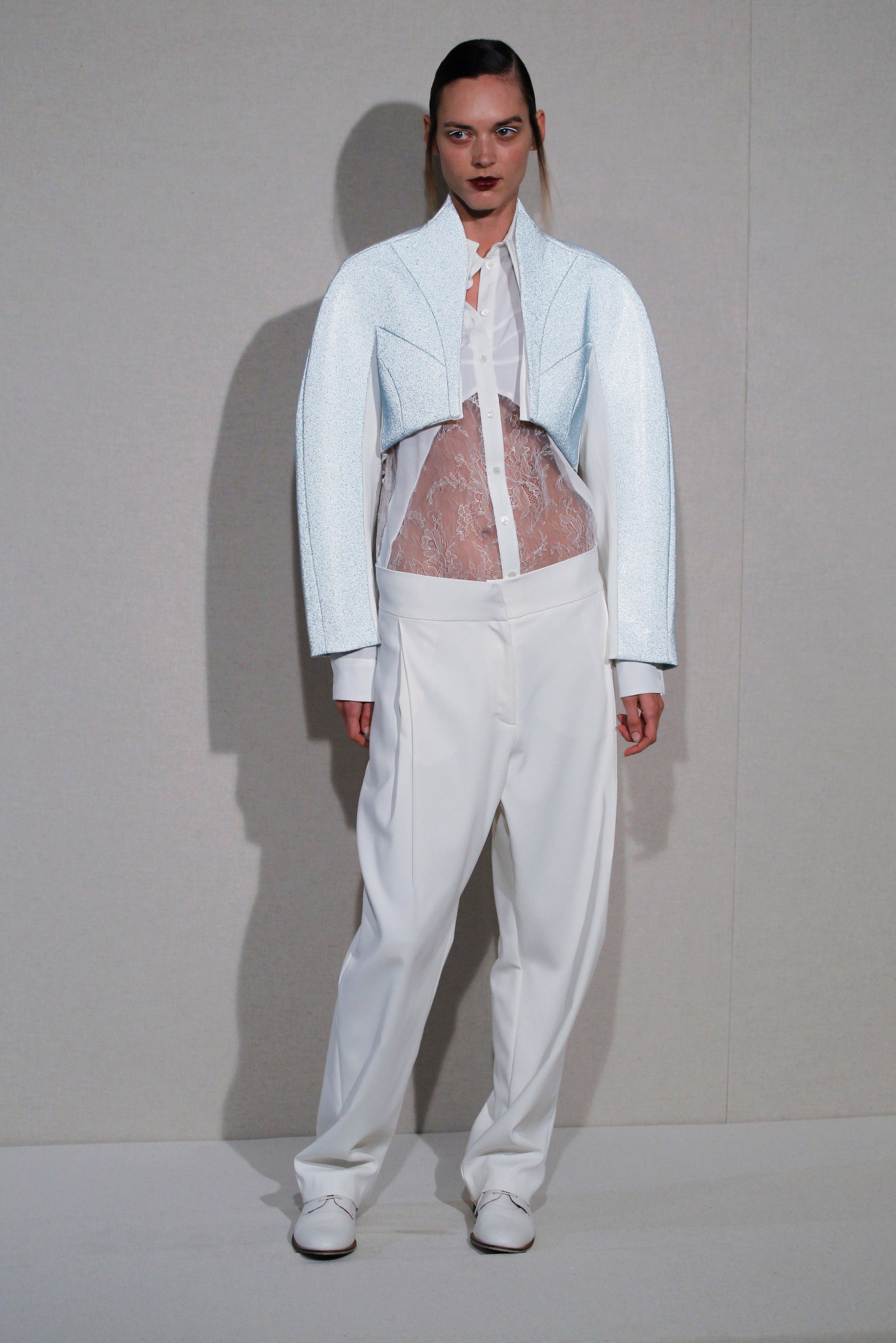 white vinyl fitted jacket with shirt and pants