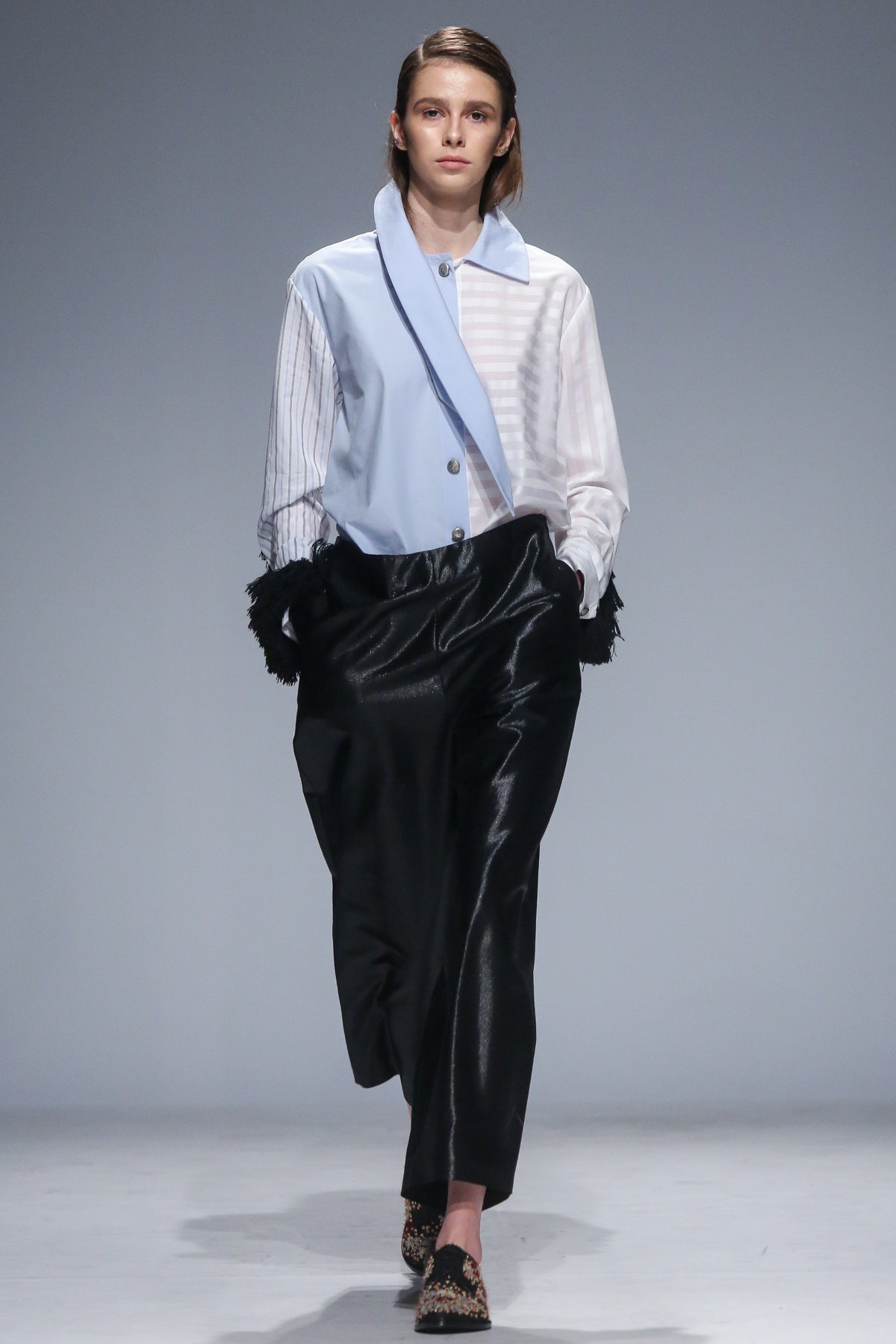 blue and white relaxed shirt with black pants