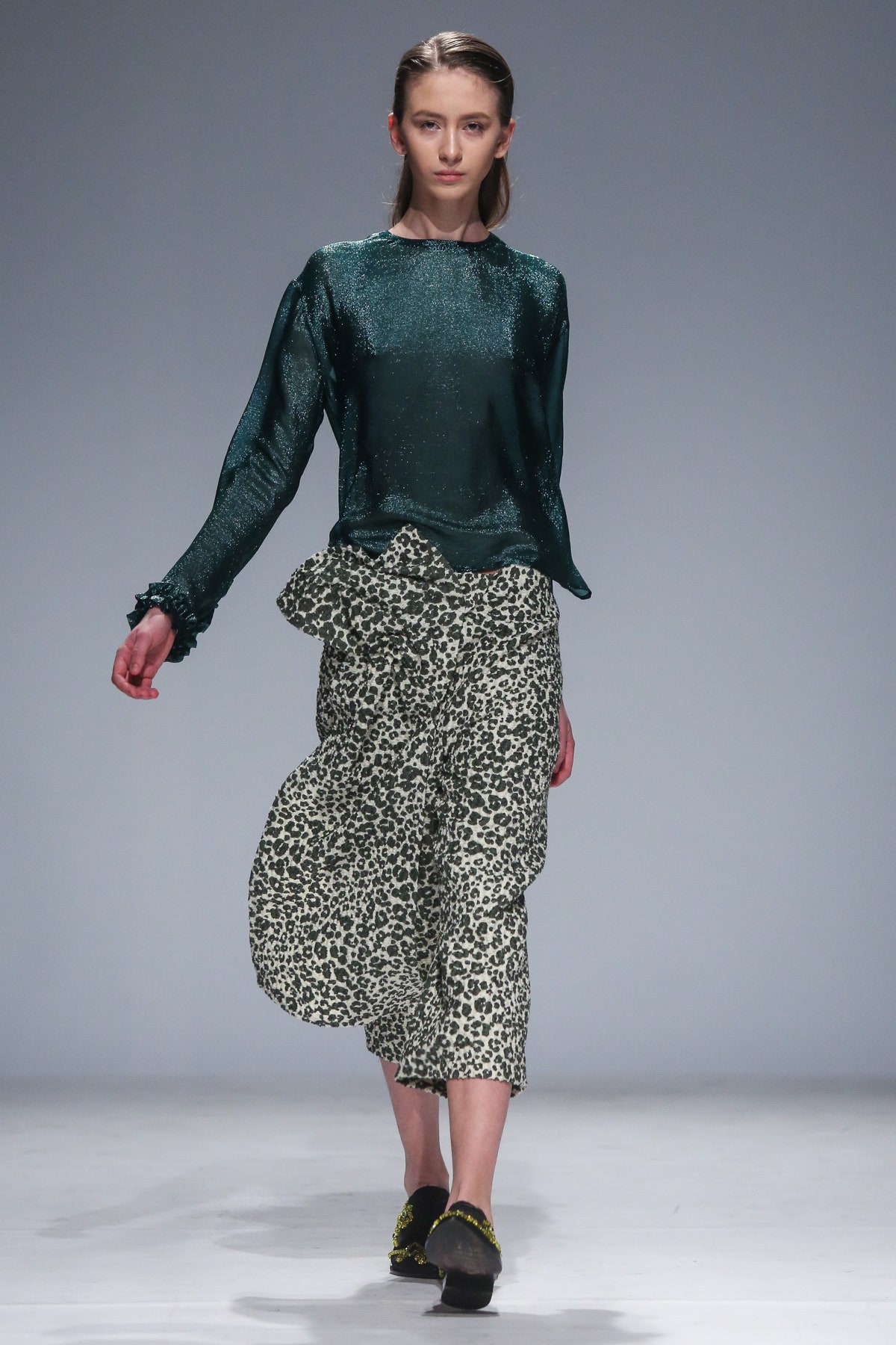 green silk top with flared skirt