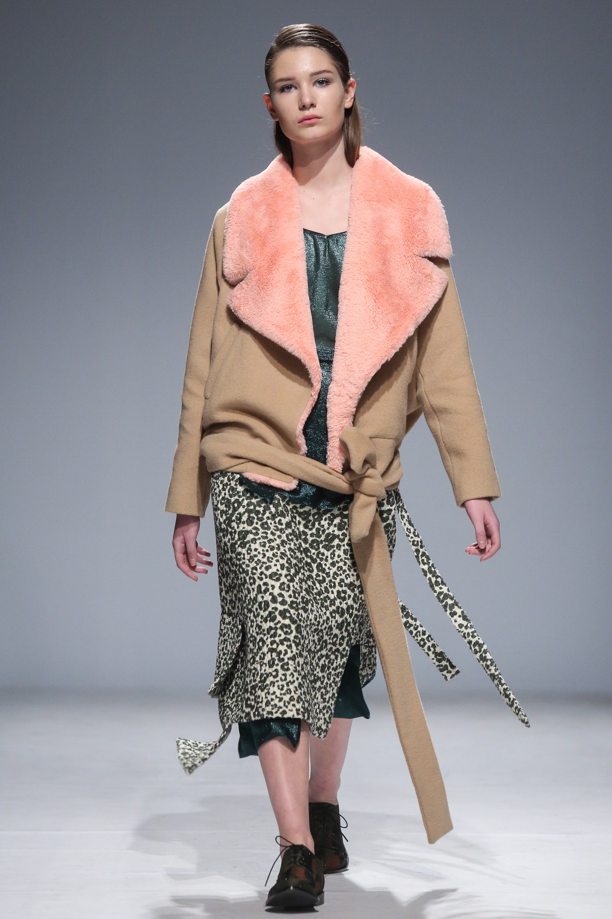 beige jacket with pink collar