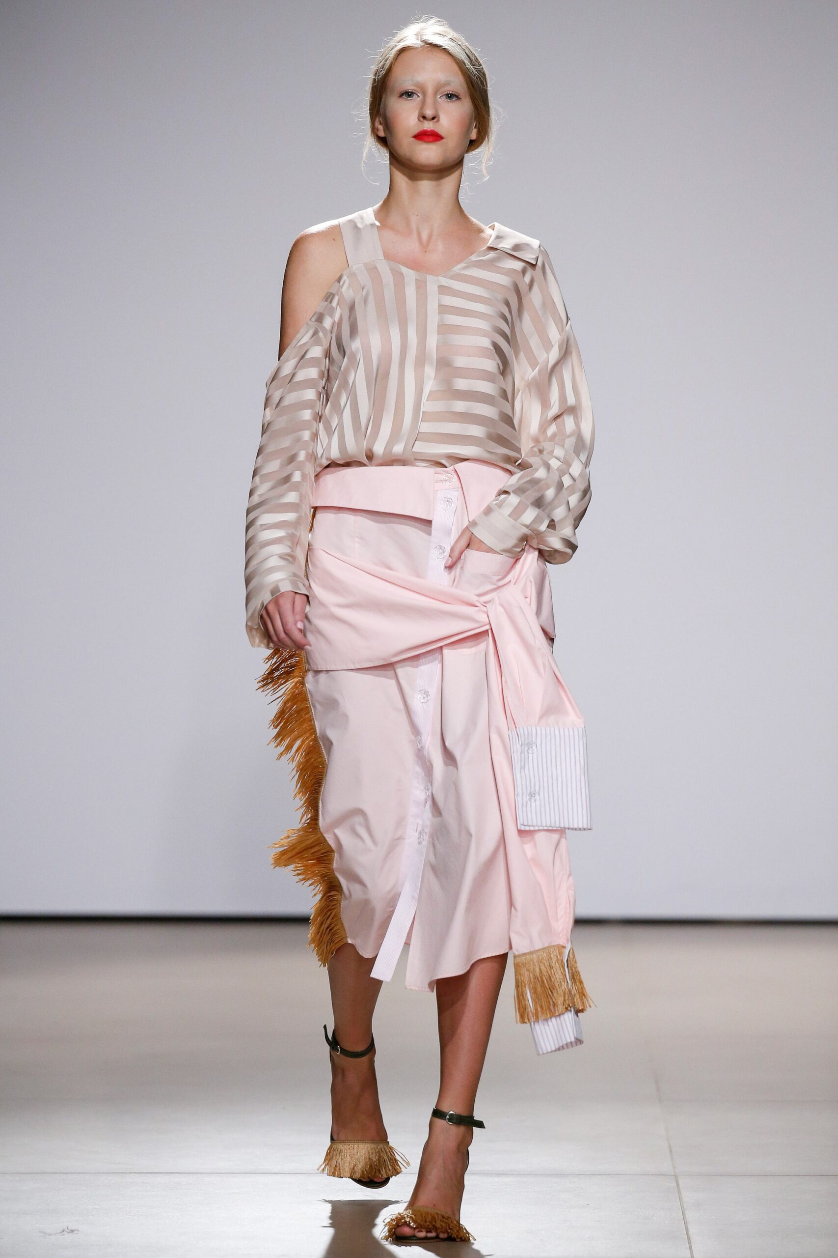 beige striped blouse with pink skirt