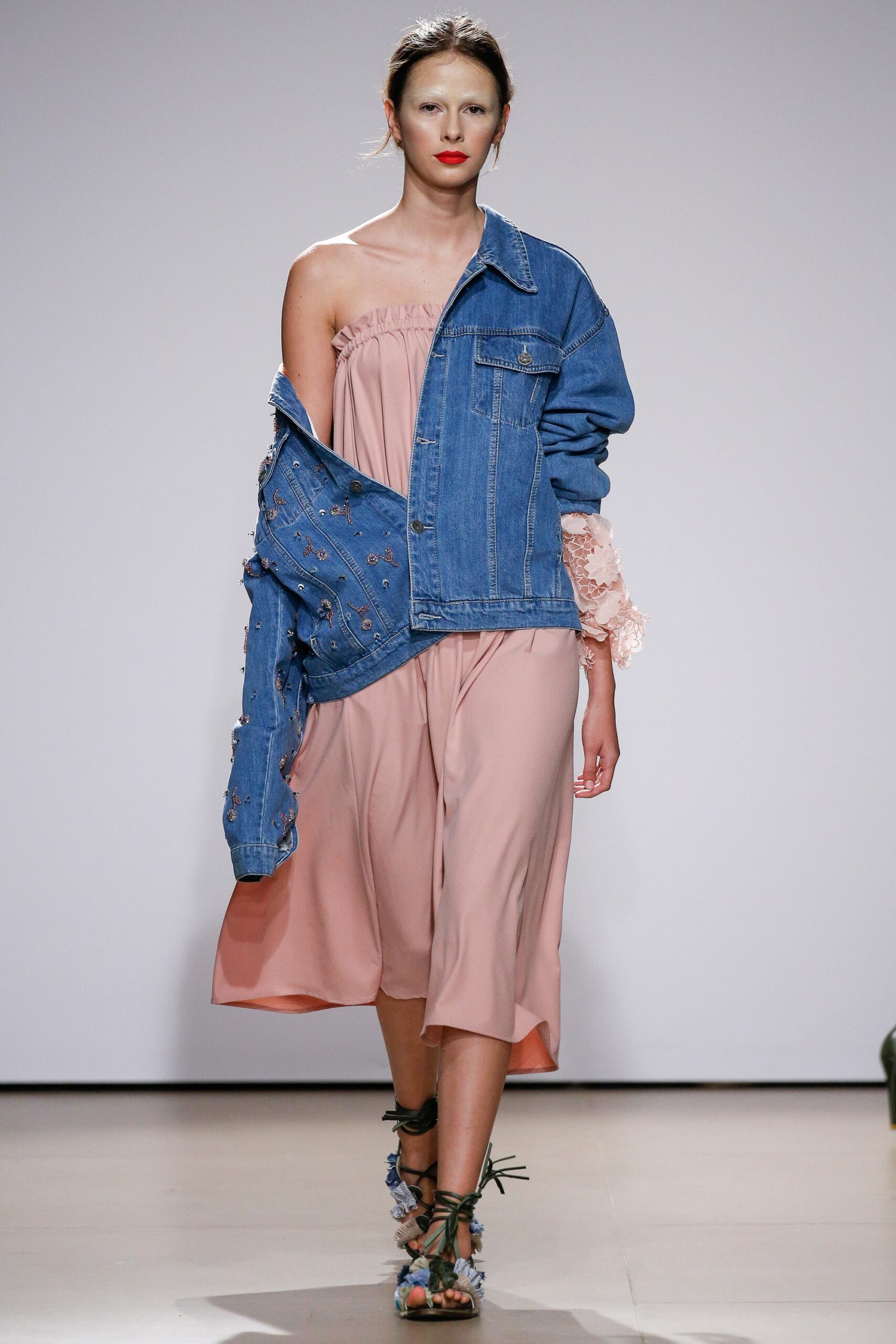 pink midi dress with oversized denim jacket