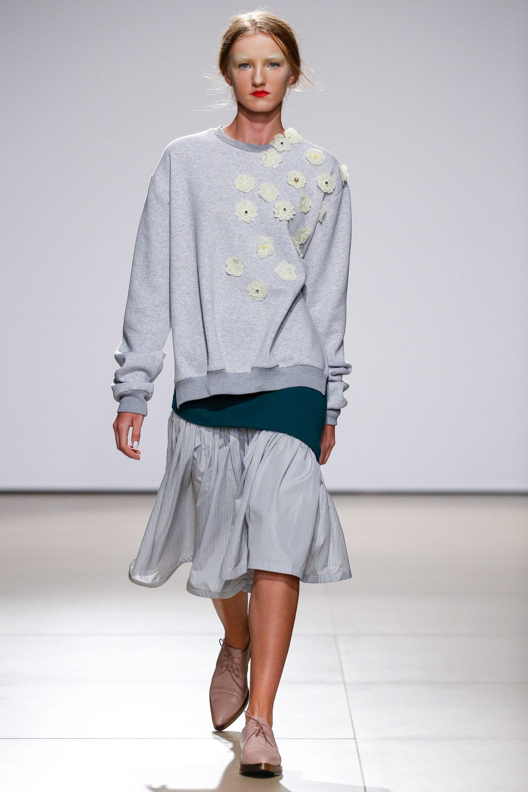 gray relaxed sweater with embroidered flowers