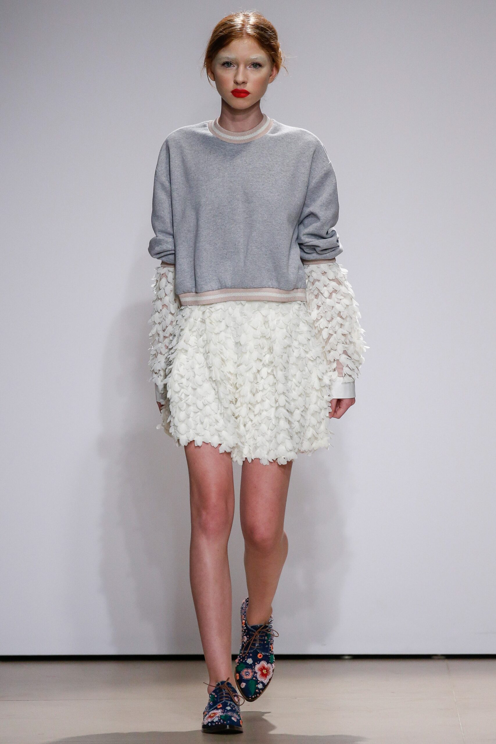 gray cotton long-sleeve collared relaxed ruffled sweater