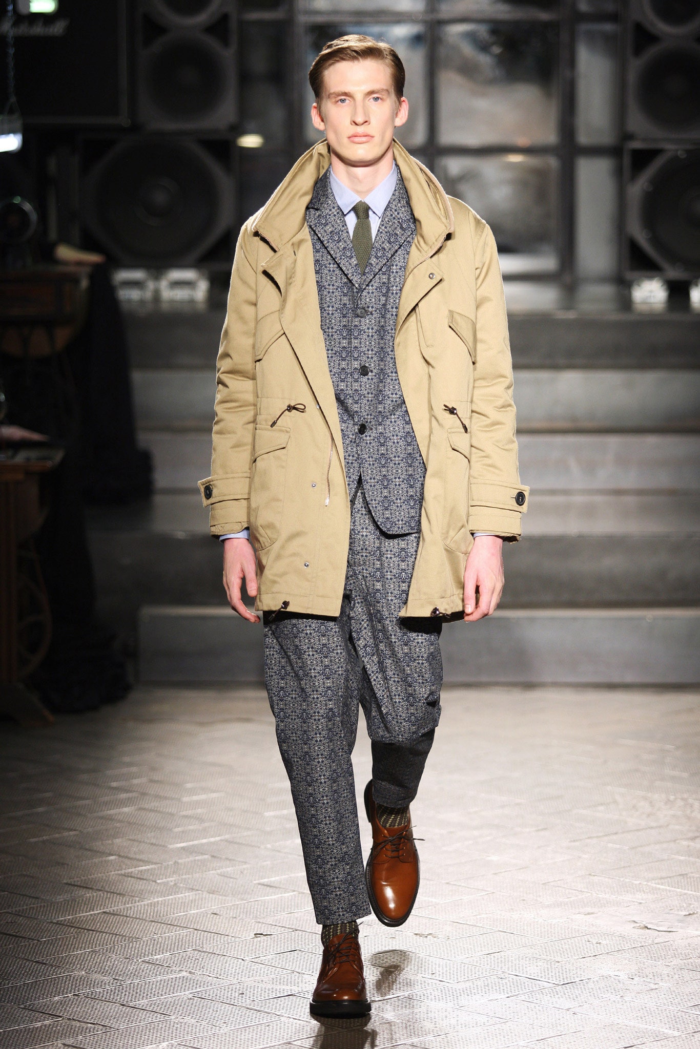 beige coat gray suit and brown shoes