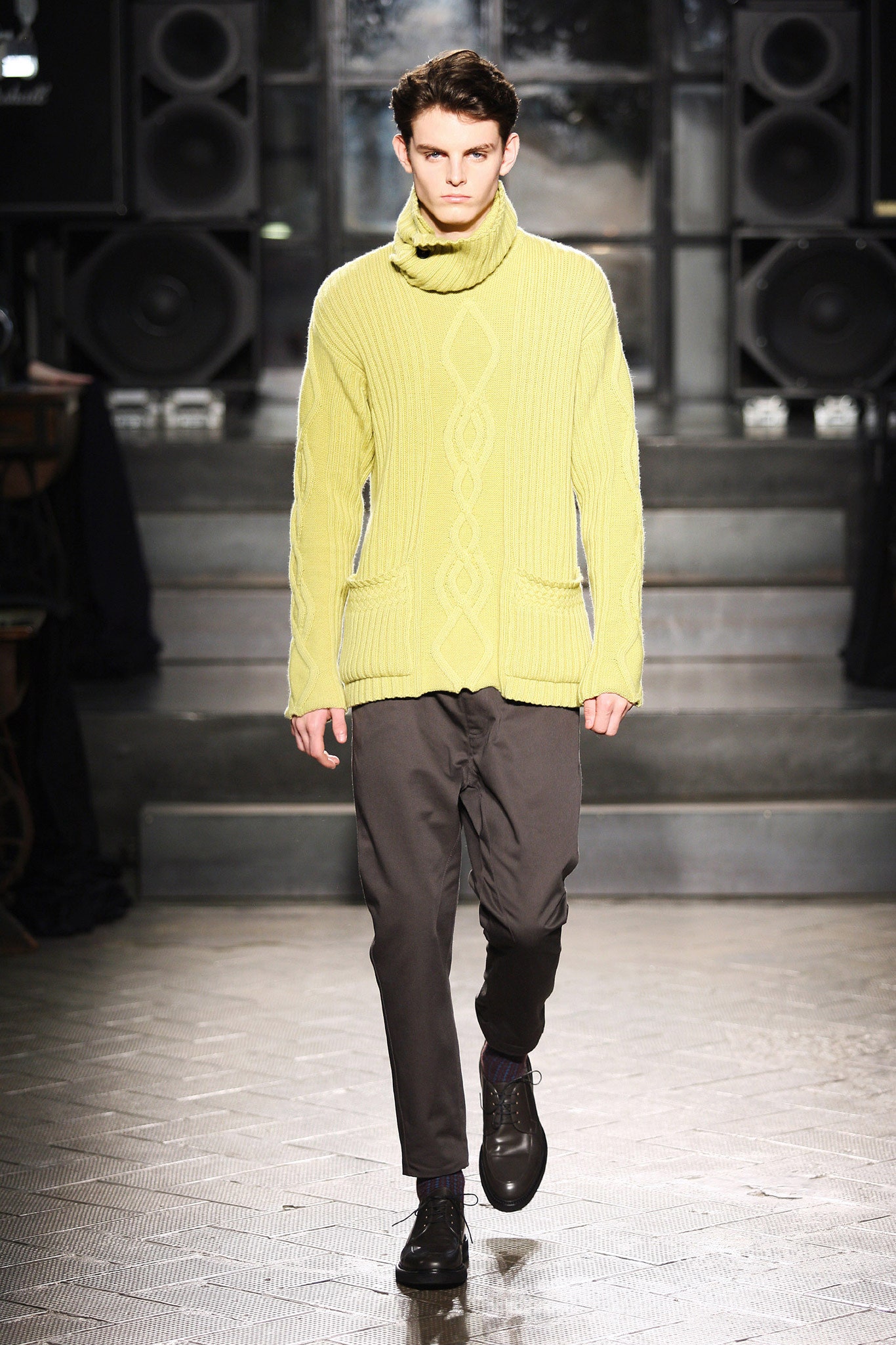 yellow knit sweater with gray pants