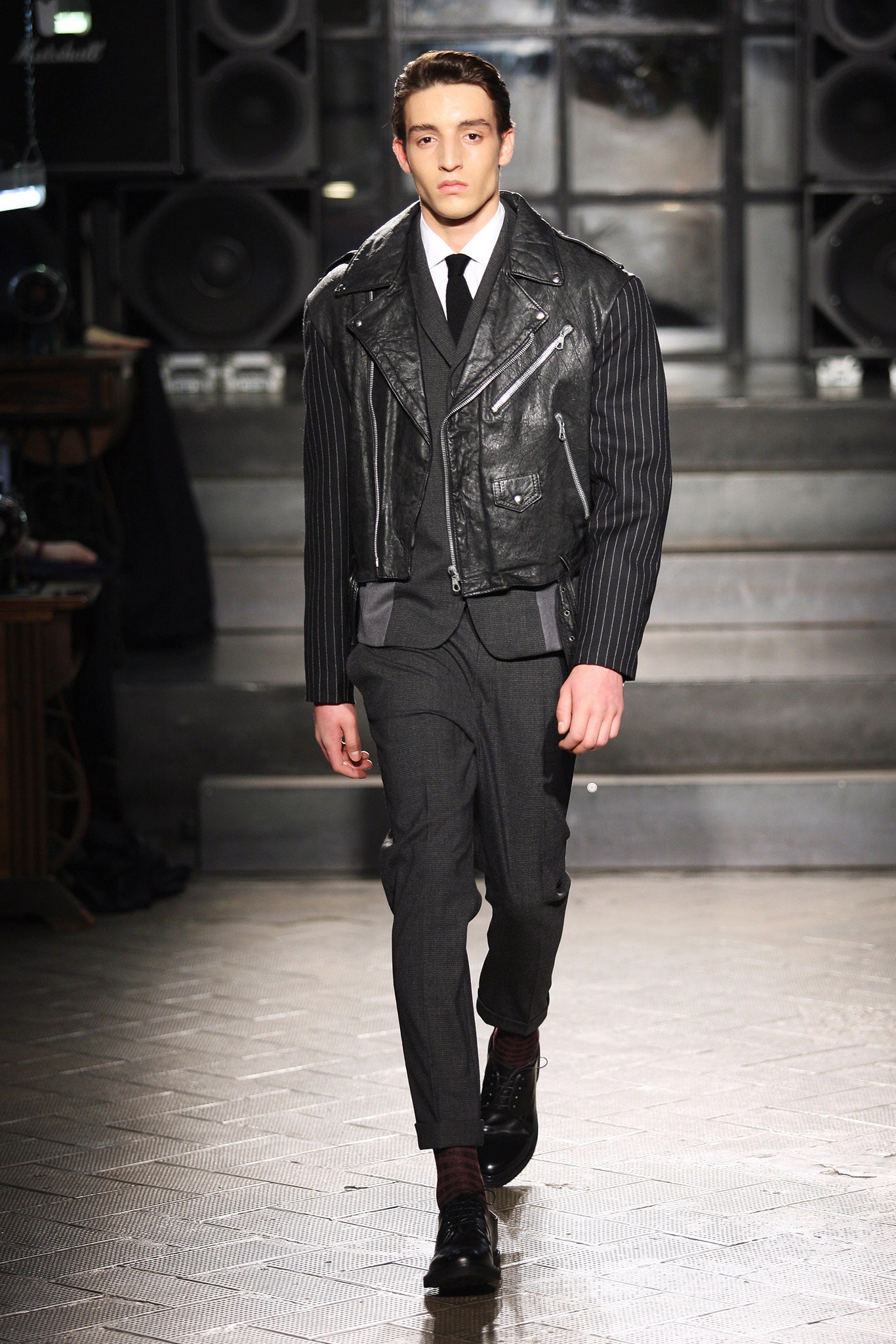 black leather jacket gray suit