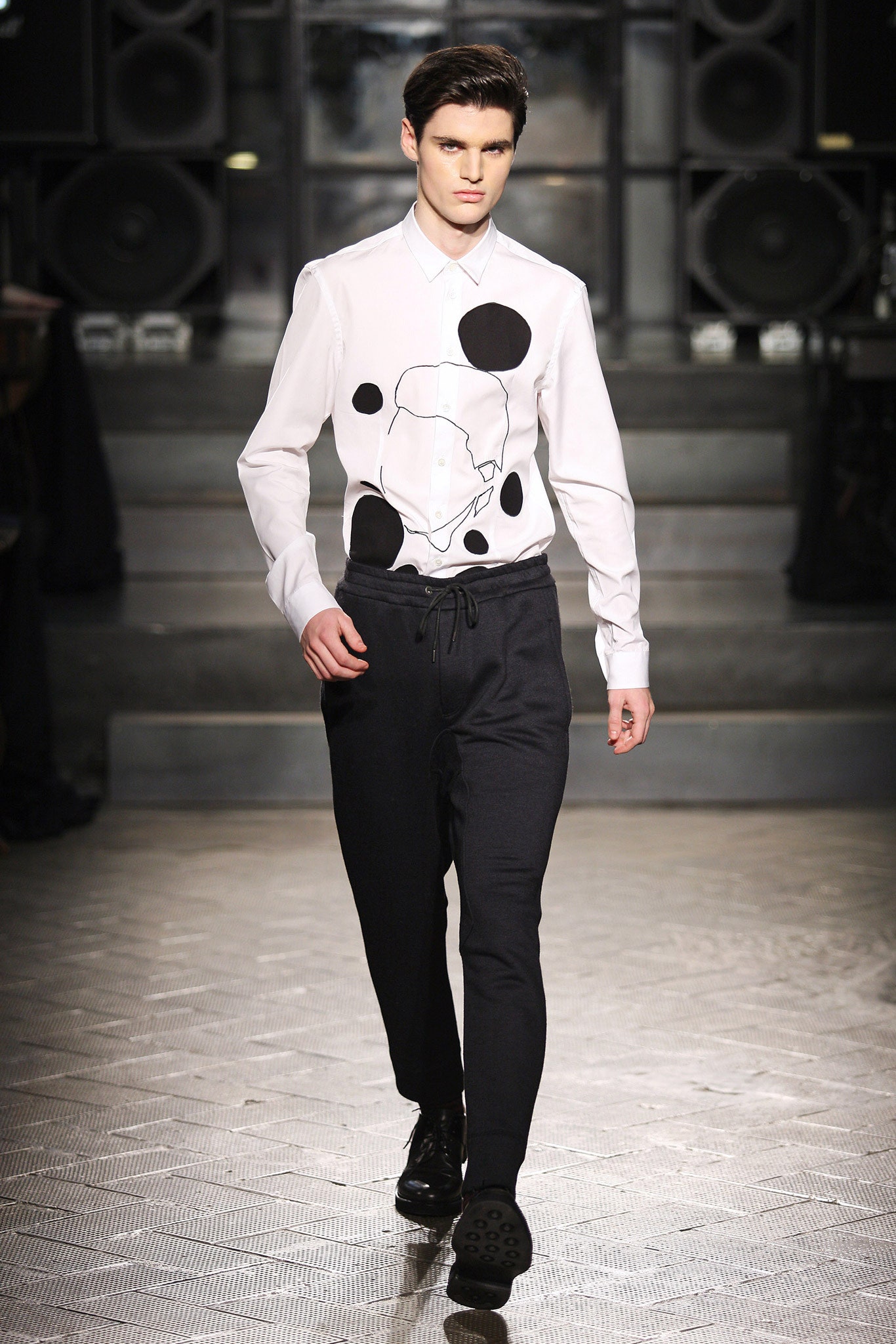 white printed shirt with black pants