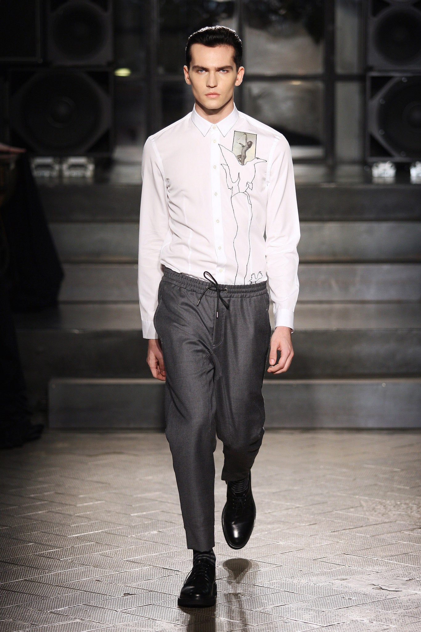 white fitted shirt and gray tailored pants