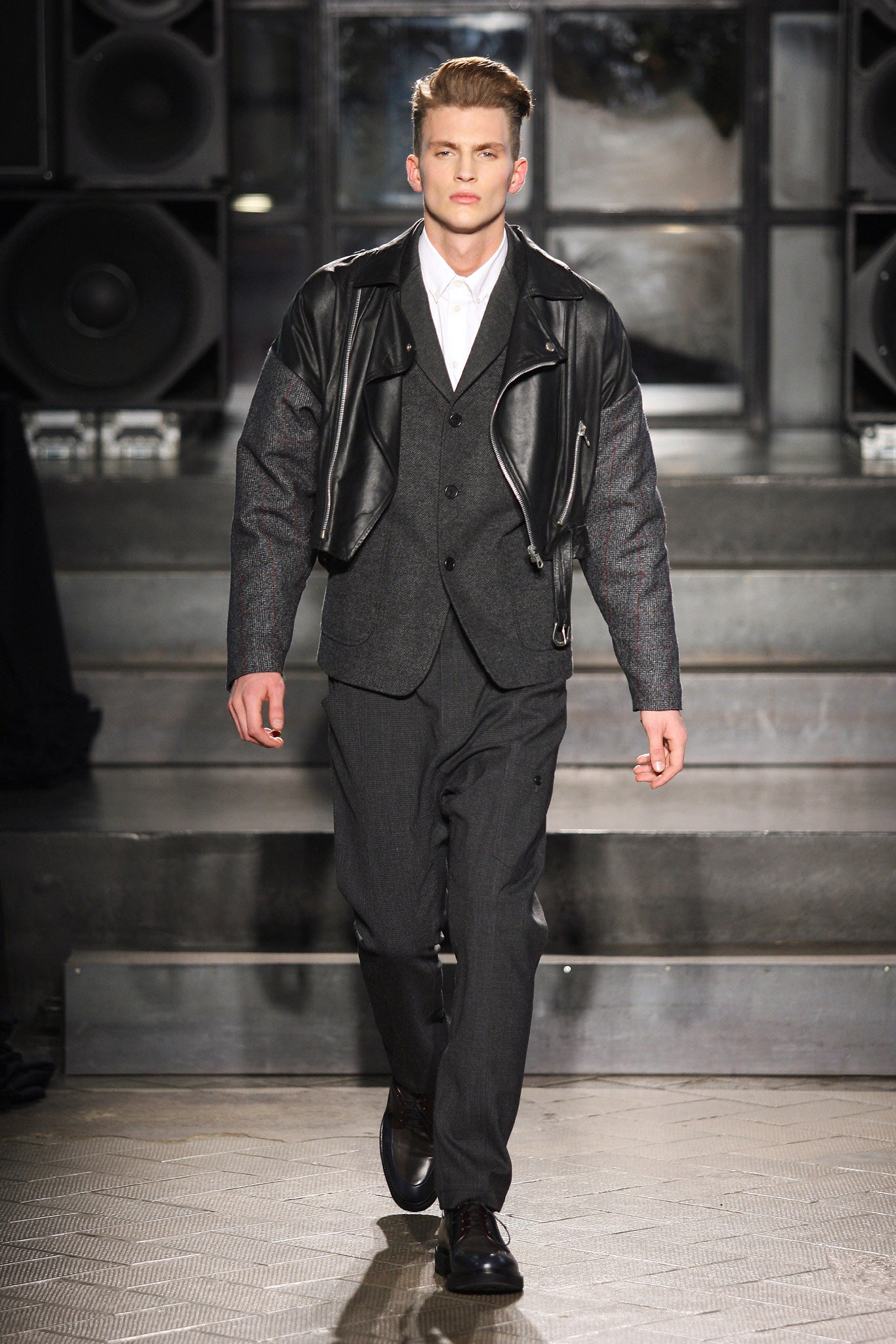 black leather jacket with gray suit