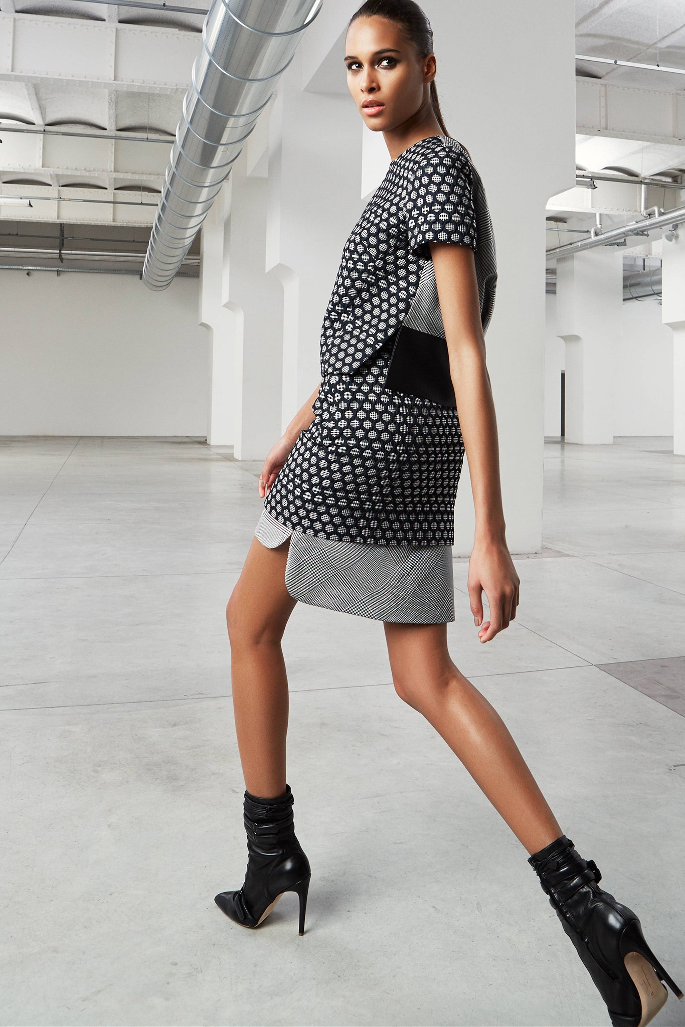 black and white printed mini dress with boots