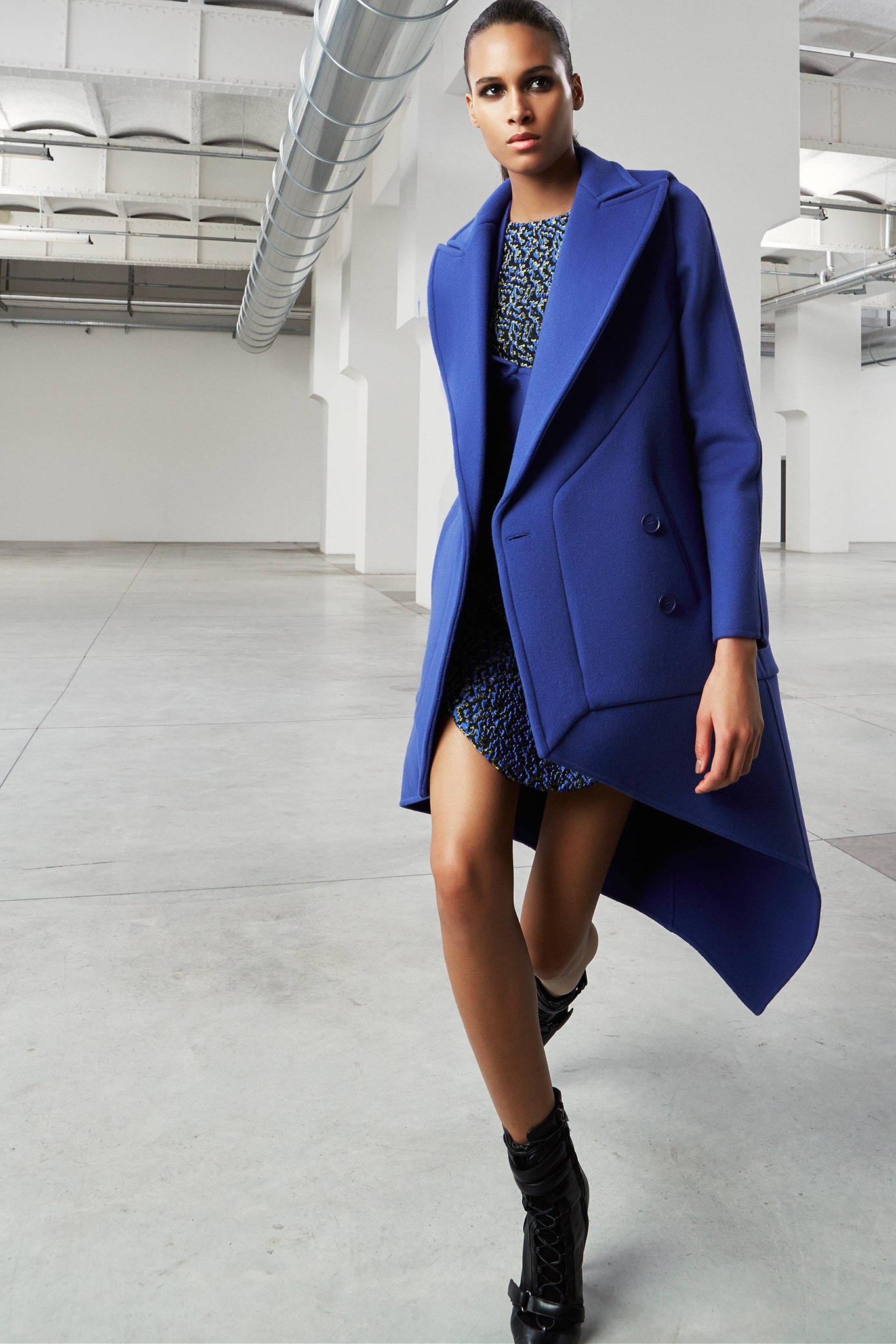 blue structured coat with multi dress
