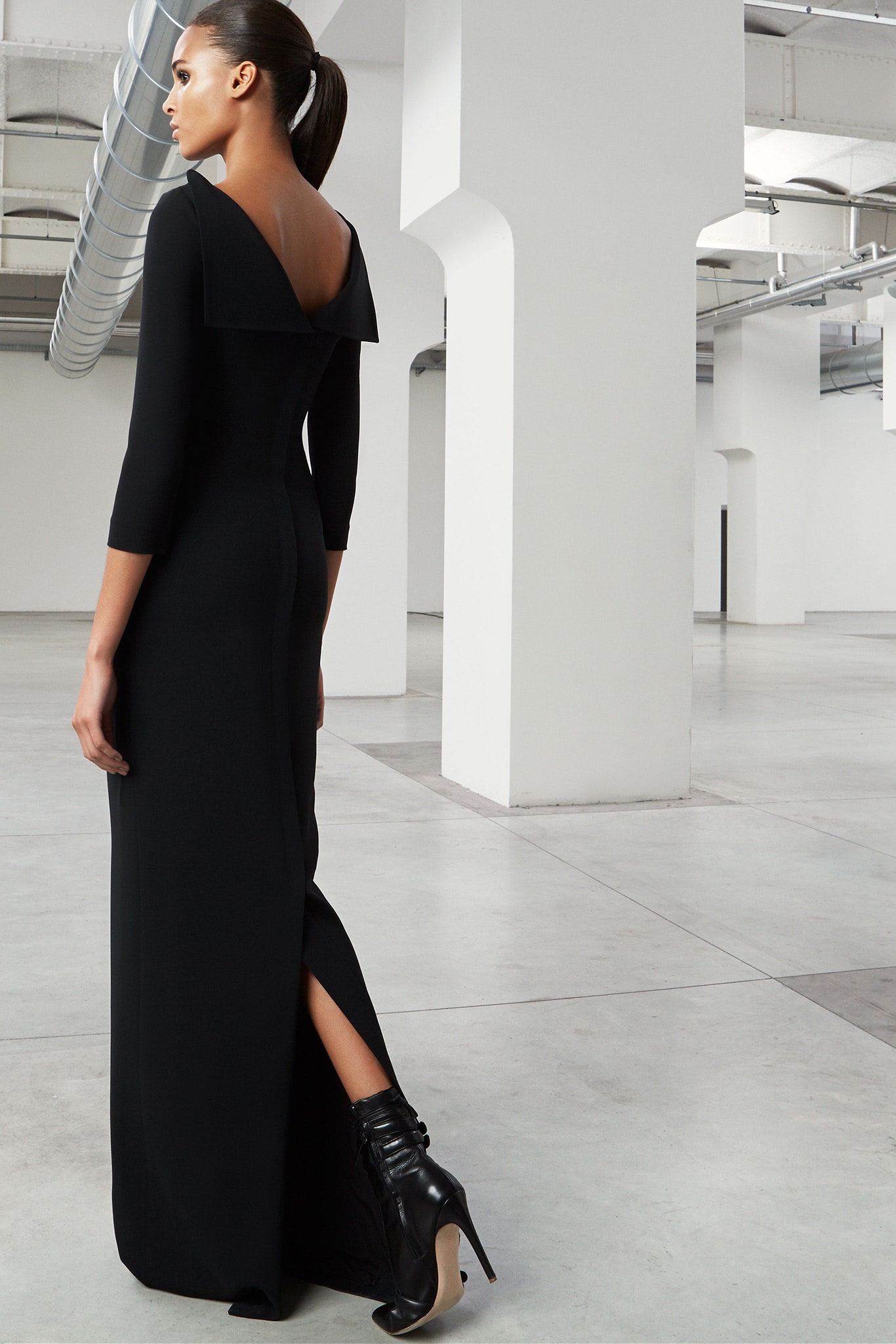 black fitted gown with slit