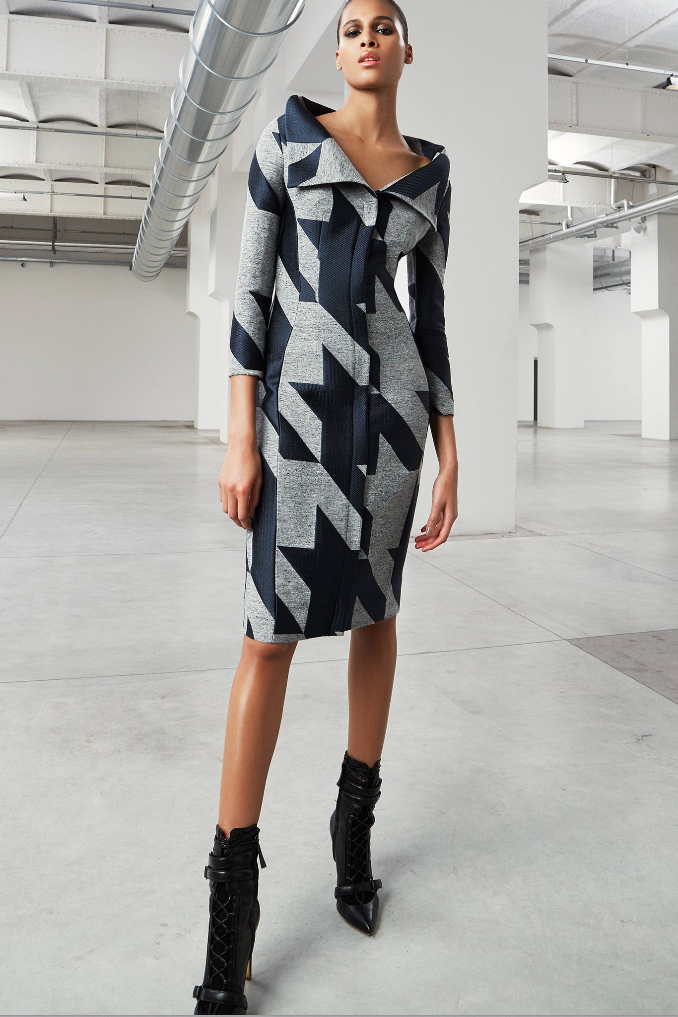 fitted blue gray printed midi dress with black boots