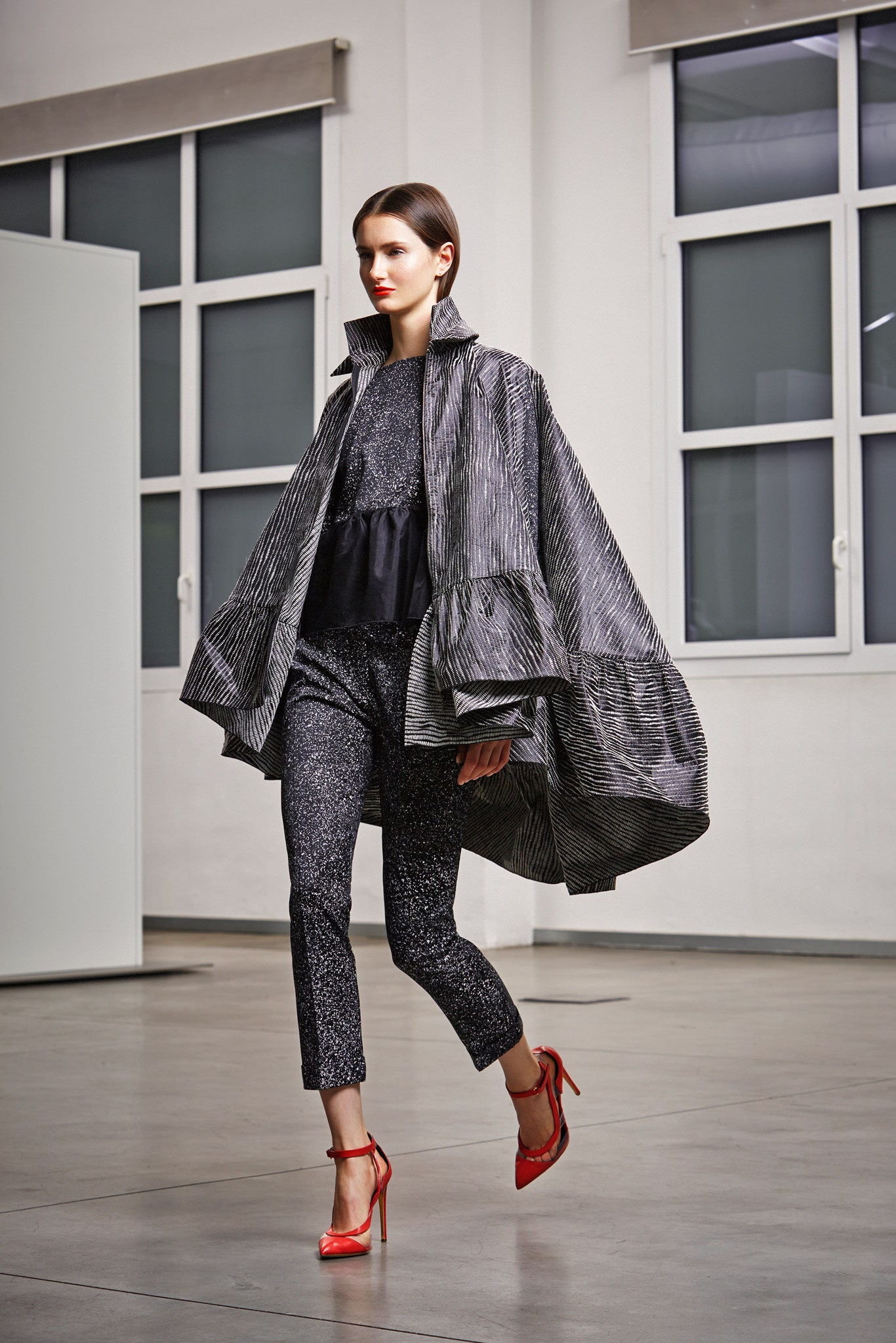 black cotton long-sleeve collared oversized layered coat