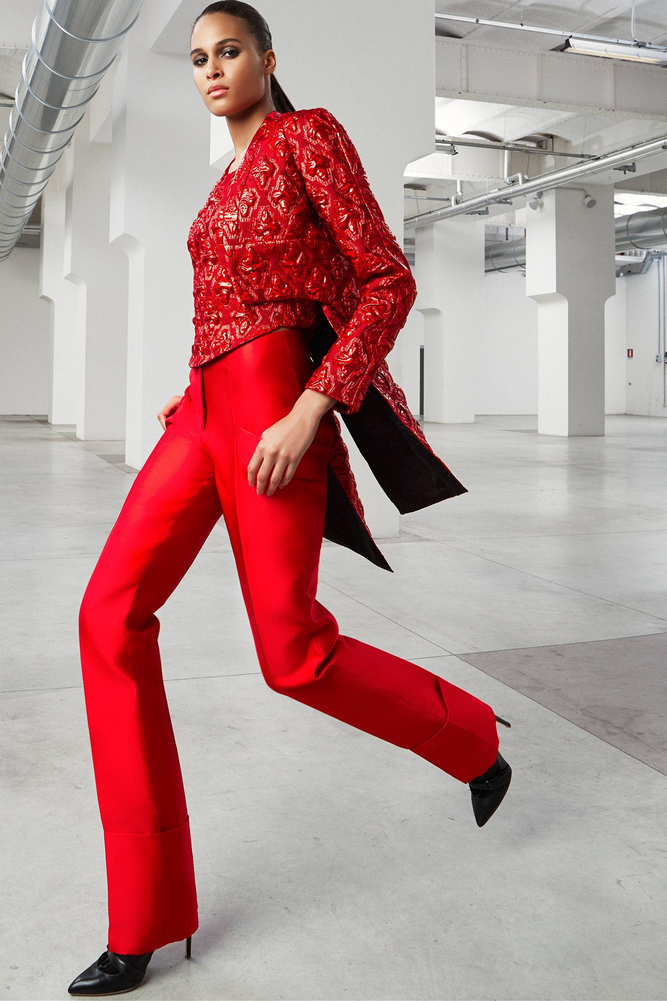 red embroidered silk top with tailored pants