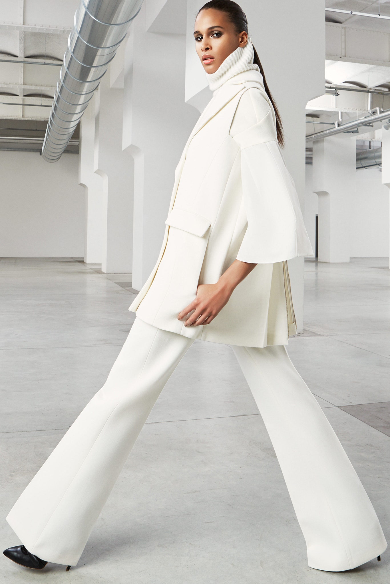 white relaxed jacket and fitted pants