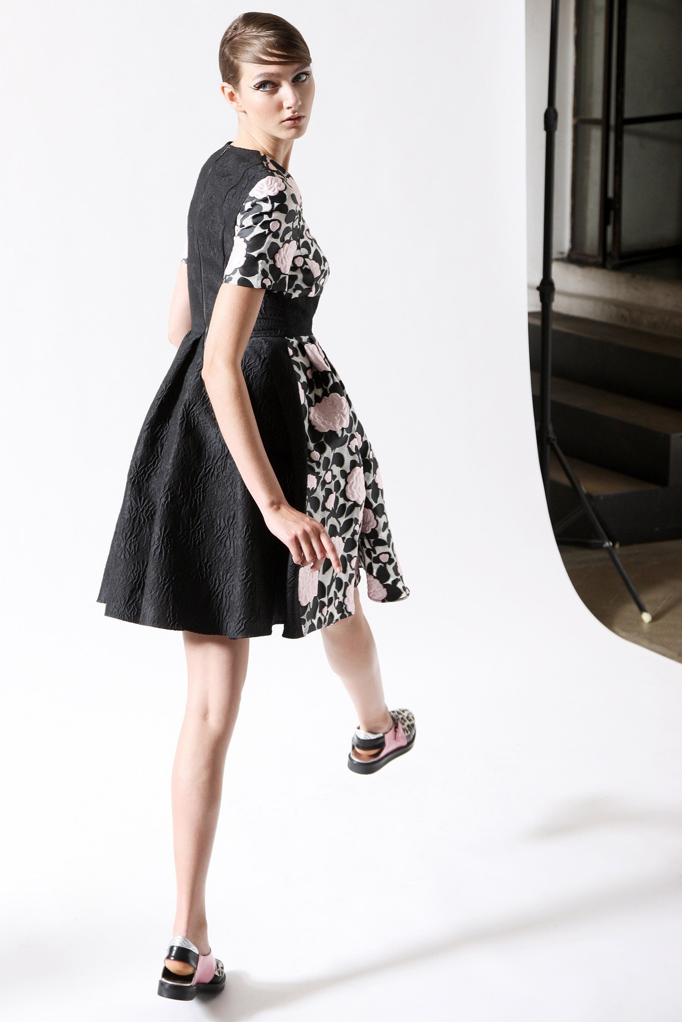 black and pink pleated mini dress