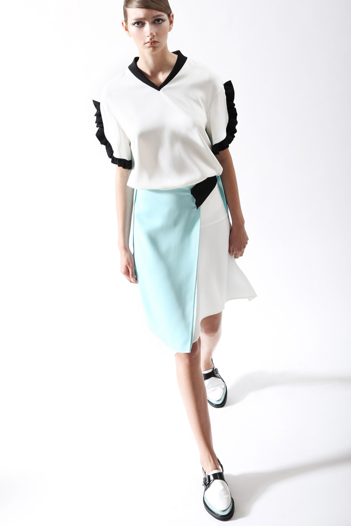 fitted white black top with asymmetric skirt
