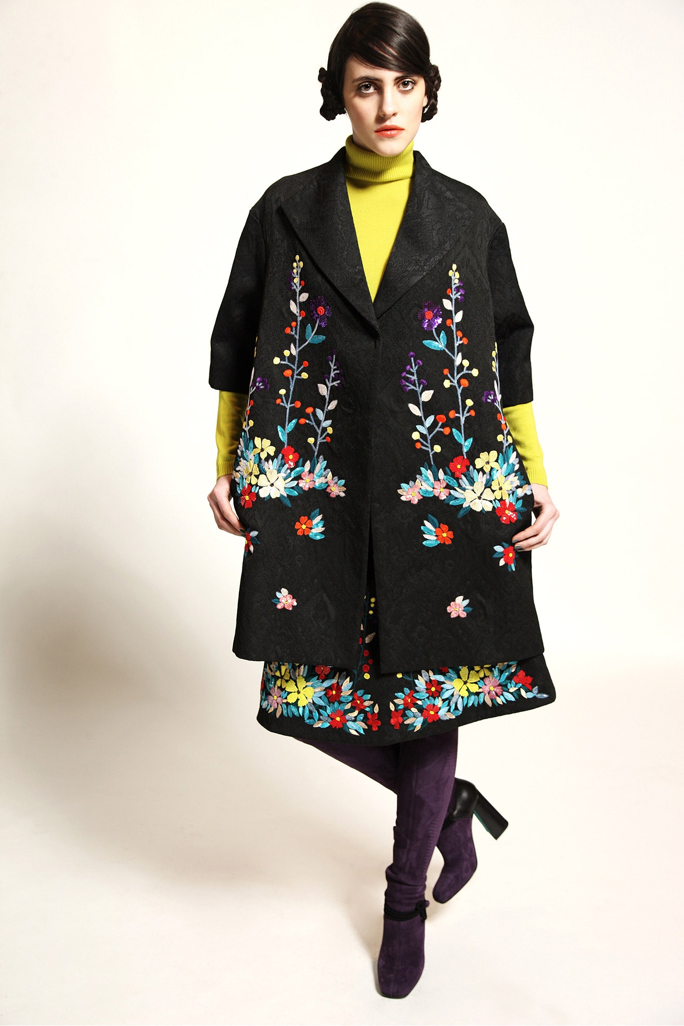 black embroidered coat with yellow top