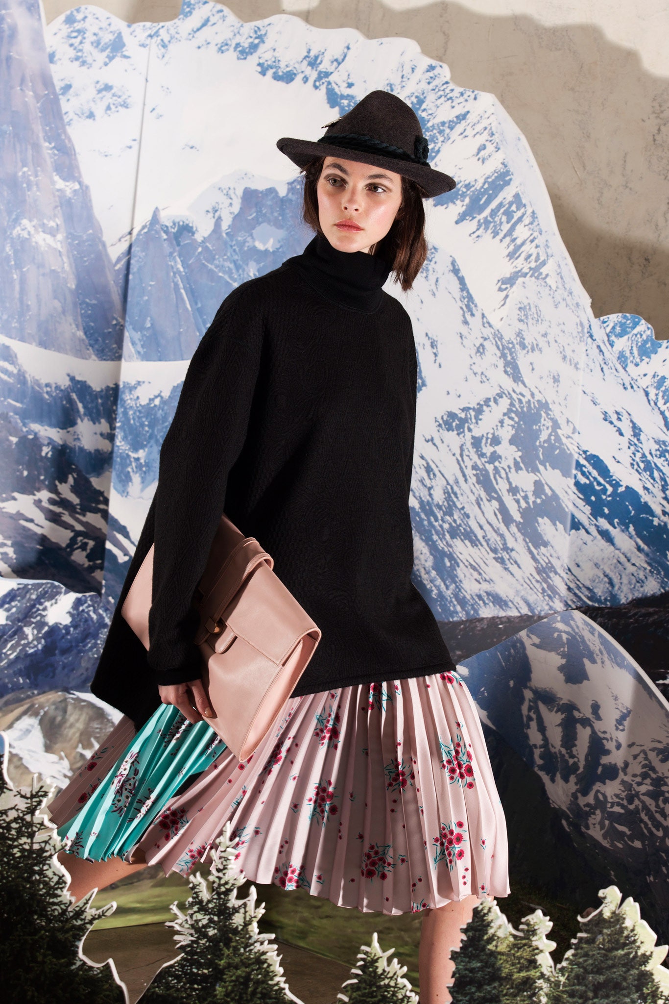 black oversized sweater with pleated skirt
