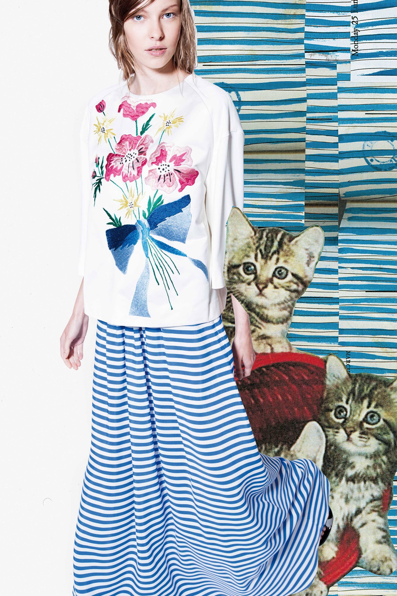 white embroidered top with blue striped maxi skirt