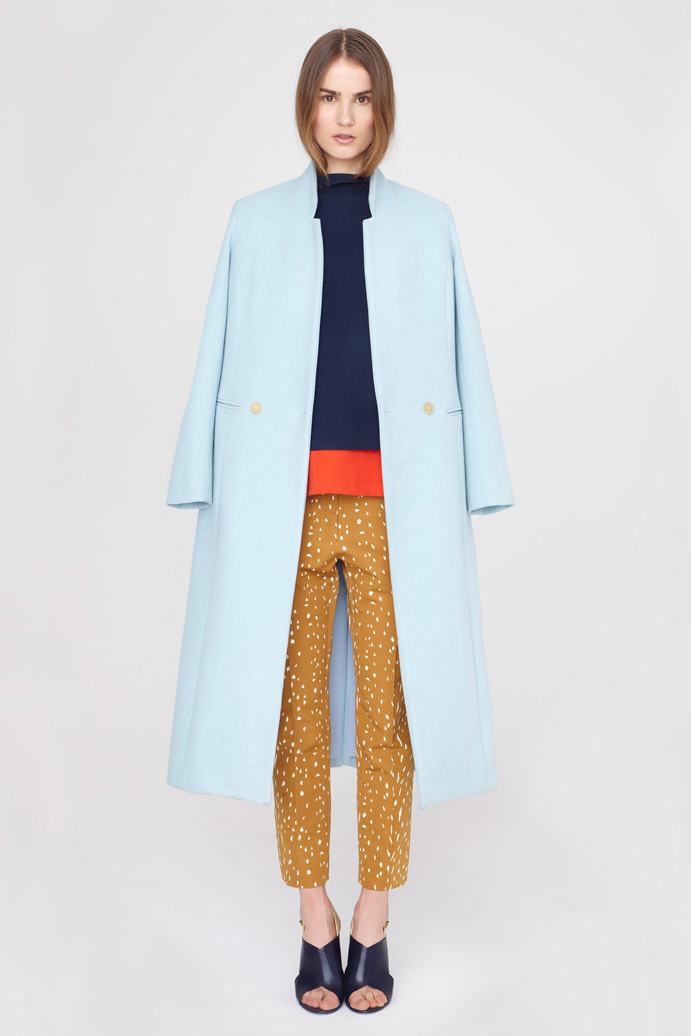 blue long-sleeve collared relaxed buttoned coat