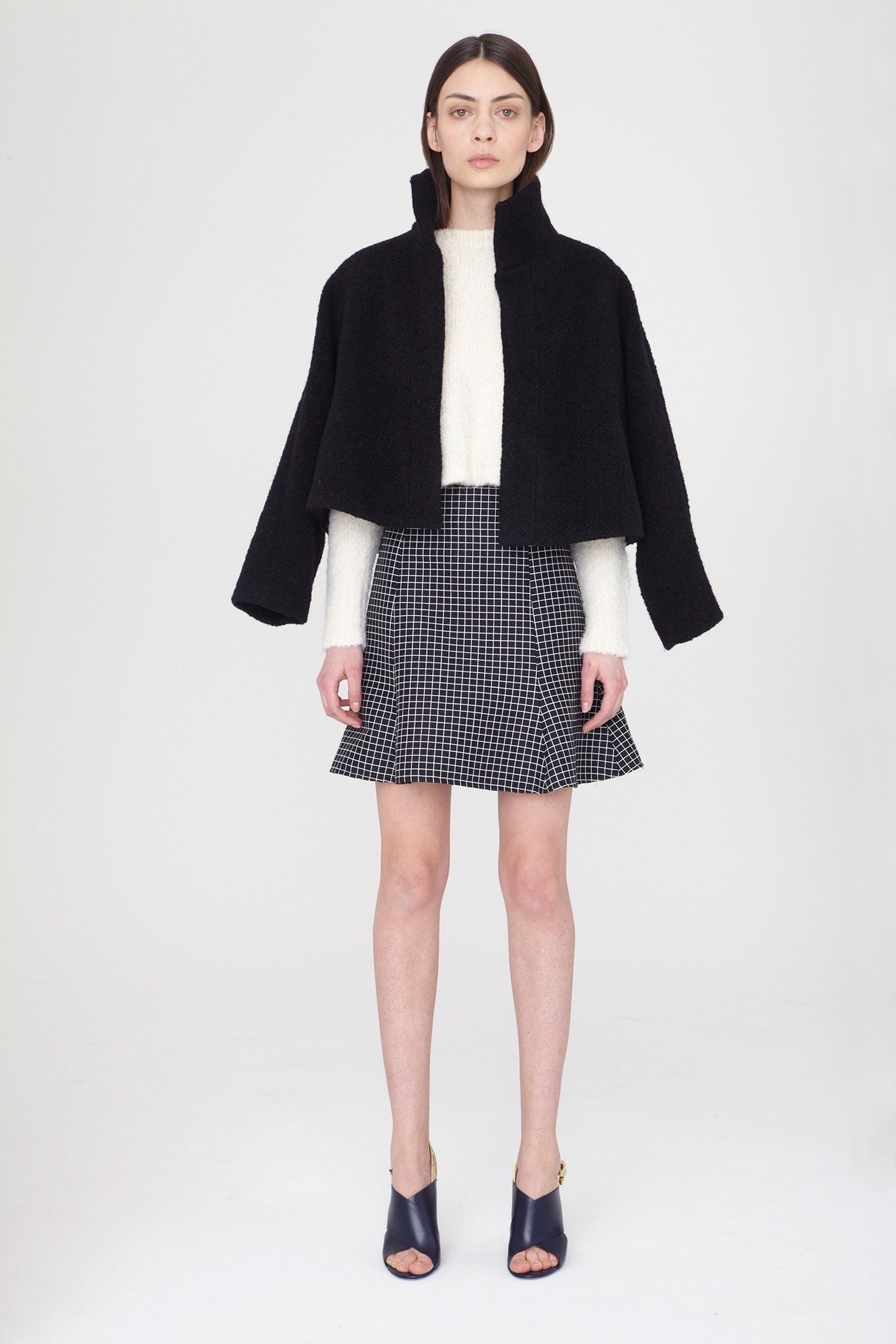 black wool long-sleeve collared oversized layered jacket