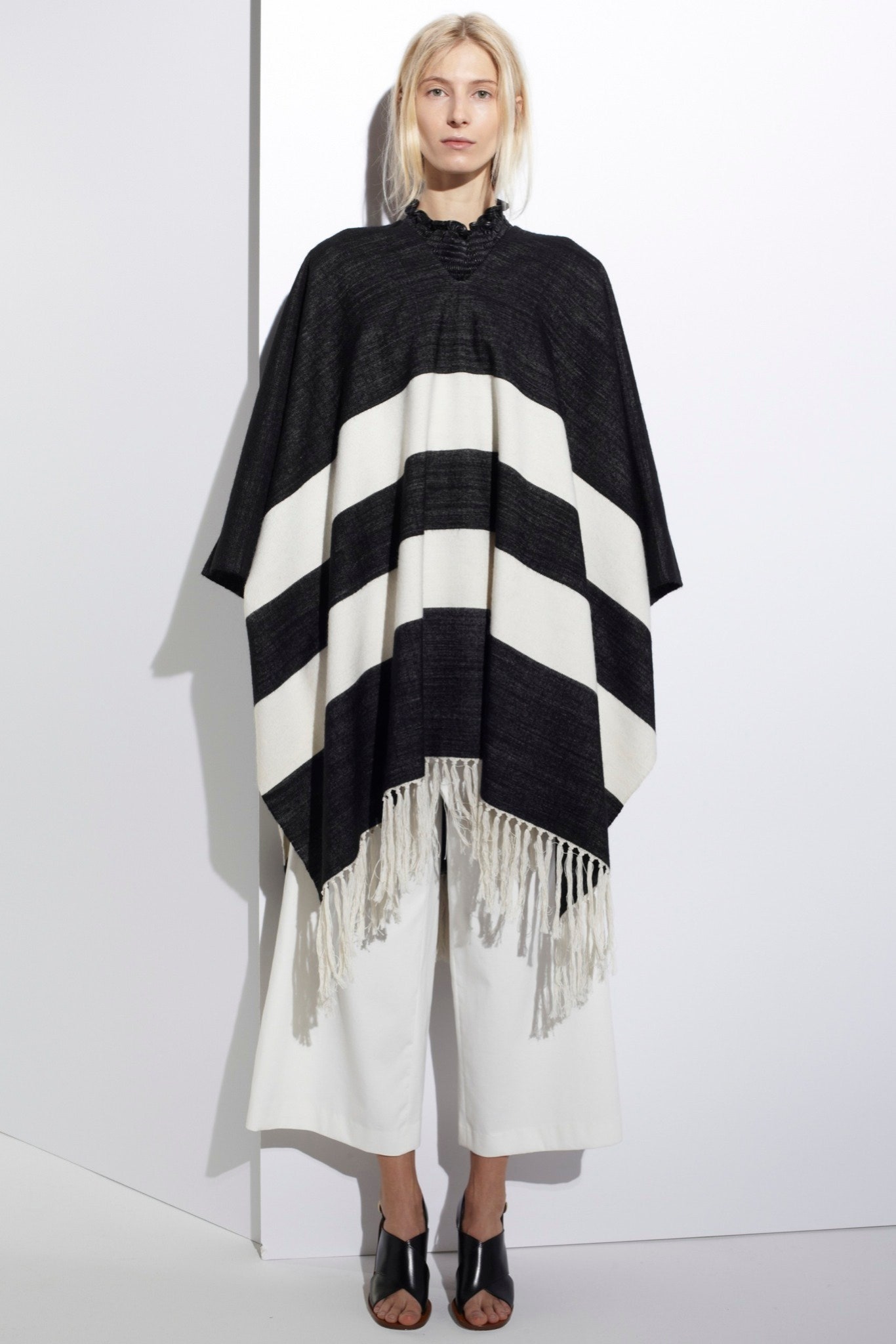 black wool sleeveless relaxed striped fringed poncho