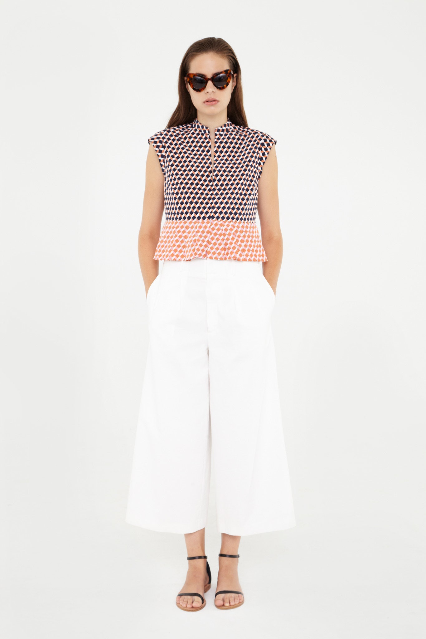 fitted black and white top with wide-leg pants