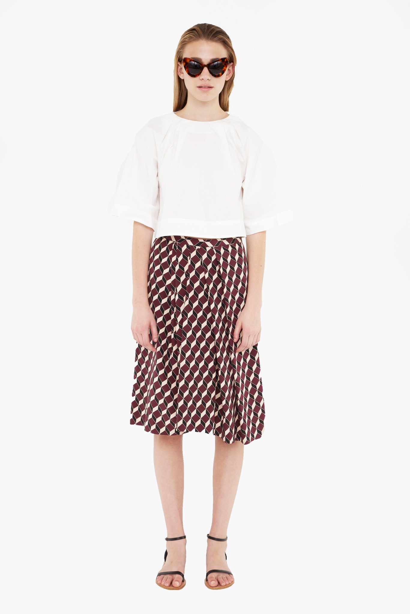 white relaxed top with pleated midi skirt